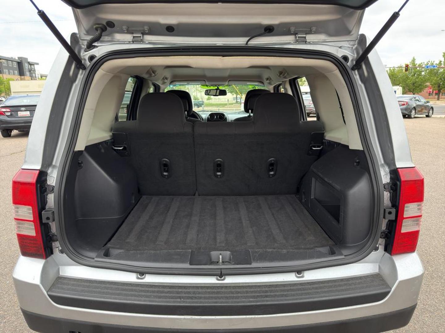 2016 SILVER Jeep Patriot Sport (1C4NJRBB0GD) with an 4 Cyl, 2.4L engine, Automatic transmission, located at 10890 W. Colfax Ave., Lakewood, CO, 80215, (303) 274-7692, 39.739914, -105.120132 - Discover the perfect blend of reliability and adventure with our 2016 Jeep Patriot Sport, now available for sale. This versatile SUV is equipped with a robust 4WD system, making it an ideal companion for both city drives and off-road adventures. Under the hood, youll find a fuel-efficient 4-cylinder - Photo#12