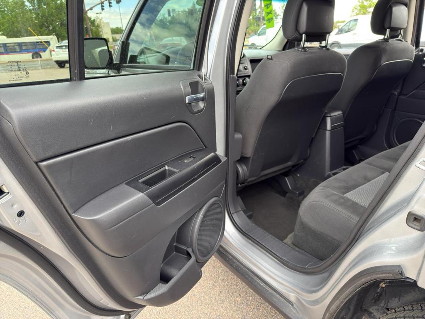 2016 SILVER Jeep Patriot Sport (1C4NJRBB0GD) with an 4 Cyl, 2.4L engine, Automatic transmission, located at 10890 W. Colfax Ave., Lakewood, CO, 80215, (303) 274-7692, 39.739914, -105.120132 - Discover the perfect blend of reliability and adventure with our 2016 Jeep Patriot Sport, now available for sale. This versatile SUV is equipped with a robust 4WD system, making it an ideal companion for both city drives and off-road adventures. Under the hood, youll find a fuel-efficient 4-cylinder - Photo#13