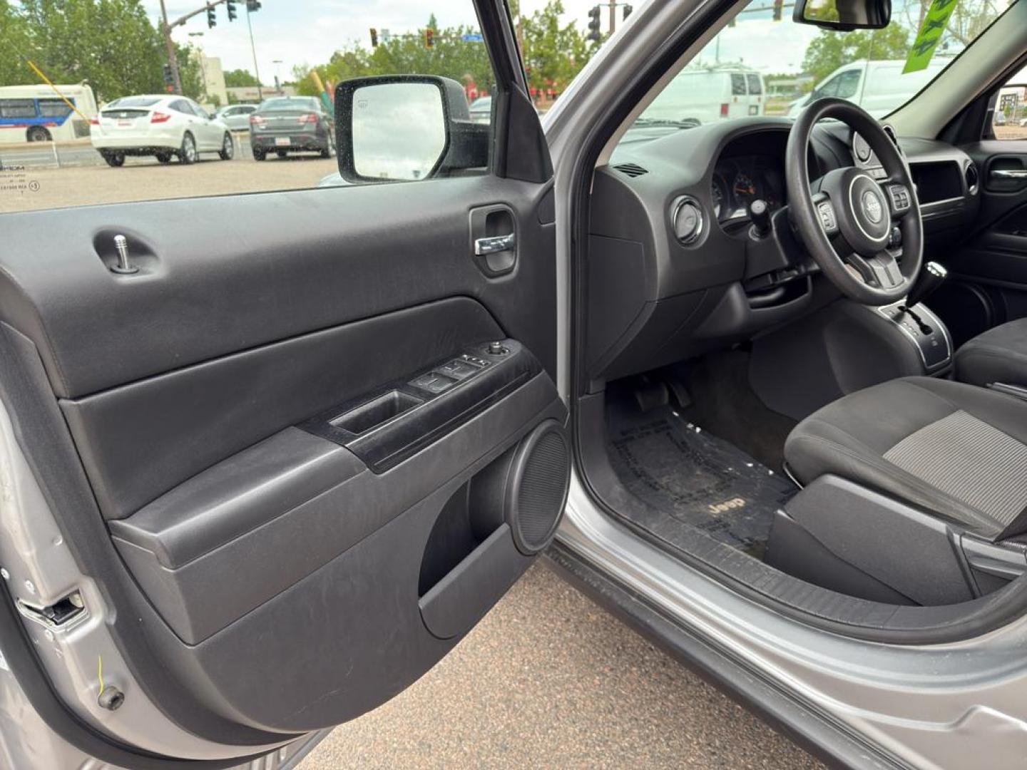2016 SILVER Jeep Patriot Sport (1C4NJRBB0GD) with an 4 Cyl, 2.4L engine, Automatic transmission, located at 10890 W. Colfax Ave., Lakewood, CO, 80215, (303) 274-7692, 39.739914, -105.120132 - Discover the perfect blend of reliability and adventure with our 2016 Jeep Patriot Sport, now available for sale. This versatile SUV is equipped with a robust 4WD system, making it an ideal companion for both city drives and off-road adventures. Under the hood, youll find a fuel-efficient 4-cylinder - Photo#15