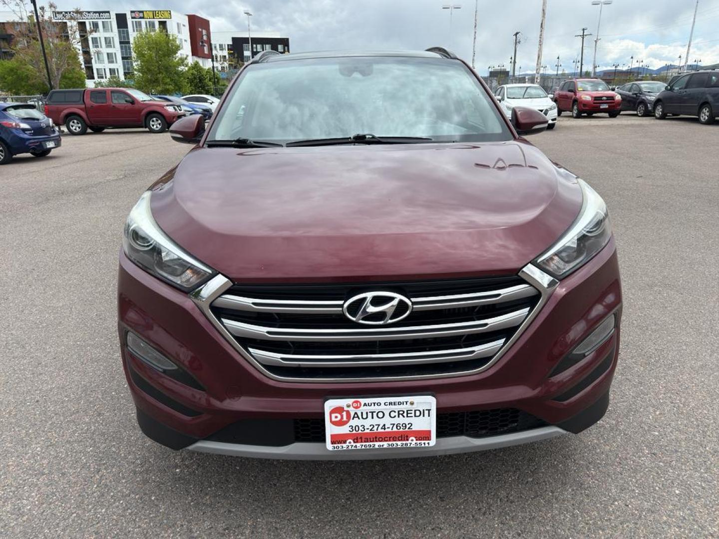 2017 RED Hyundai Tucson ECO (KM8J33A29HU) with an 4 Cyl, 1.6L engine, Automatic transmission, located at 10890 W. Colfax Ave., Lakewood, CO, 80215, (303) 274-7692, 39.739914, -105.120132 - Discover the perfect blend of efficiency and style with this exceptional 2017 Hyundai Tucson ECO! This compact SUV is designed for those who crave adventure and value performance, all wrapped up in a sleek, modern package. Under the hood, you'll find a spirited 1.6L 4-cylinder engine that delivers a - Photo#1