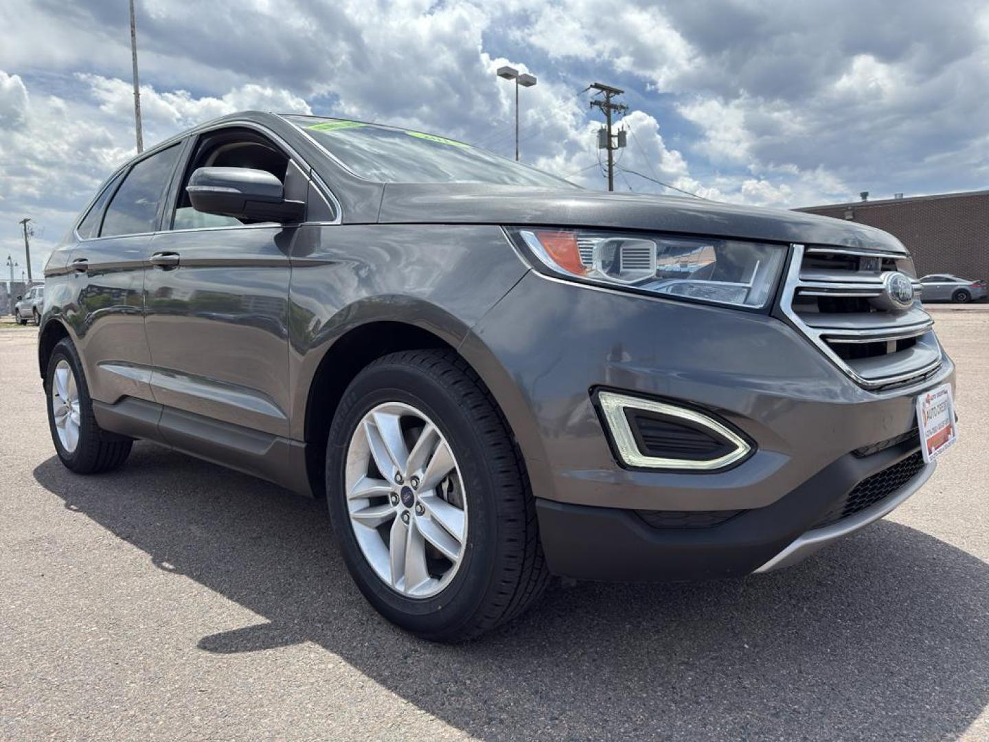 2015 GRAY Ford Edge SEL (2FMTK4J88FB) with an V6, 3.5L engine, Automatic transmission, located at 10890 W. Colfax Ave., Lakewood, CO, 80215, (303) 274-7692, 39.739914, -105.120132 - Photo#2