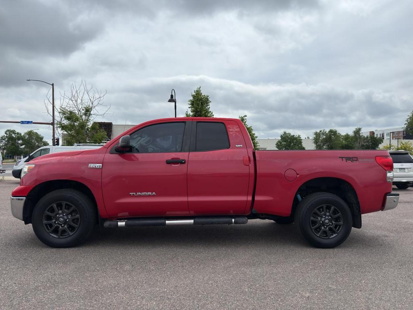 2007 RED Toyota Tundra SR5 (5TFBV54147X) with an V8, 5.7L engine, Automatic transmission, located at 10890 W. Colfax Ave., Lakewood, CO, 80215, (303) 274-7692, 39.739914, -105.120132 - Introducing our robust 2007 Toyota Tundra SR5, a formidable full-size pickup designed to tackle both rugged terrains and everyday tasks with ease. This model is equipped with a powerful 5.7L V8 engine, delivering impressive performance and reliability that Toyota is renowned for. Its four-wheel-driv - Photo#7