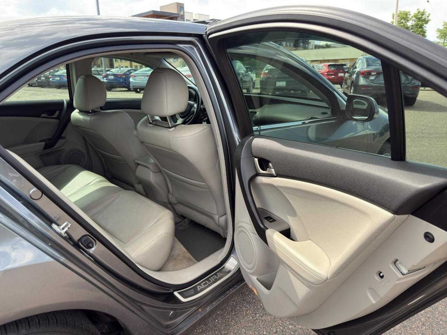 2009 GRAY Acura TSX Base w/Tech.Pkg. (JH4CU26669C) with an 4 Cyl, 2.4L engine, Automatic transmission, located at 10890 W. Colfax Ave., Lakewood, CO, 80215, (303) 274-7692, 39.739914, -105.120132 - Introducing the 2009 Acura TSX Base with Technology Package, a remarkable blend of luxury and performance. This sophisticated sedan is equipped with a robust 4-cylinder, 2.4L engine, delivering a smooth and responsive driving experience. With front-wheel drive, the Acura TSX provides excellent handl - Photo#10