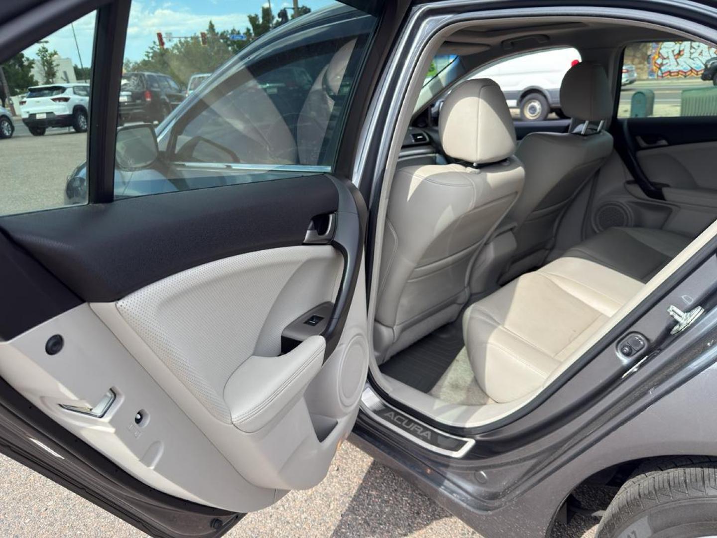 2009 GRAY Acura TSX Base w/Tech.Pkg. (JH4CU26669C) with an 4 Cyl, 2.4L engine, Automatic transmission, located at 10890 W. Colfax Ave., Lakewood, CO, 80215, (303) 274-7692, 39.739914, -105.120132 - Introducing the 2009 Acura TSX Base with Technology Package, a remarkable blend of luxury and performance. This sophisticated sedan is equipped with a robust 4-cylinder, 2.4L engine, delivering a smooth and responsive driving experience. With front-wheel drive, the Acura TSX provides excellent handl - Photo#12