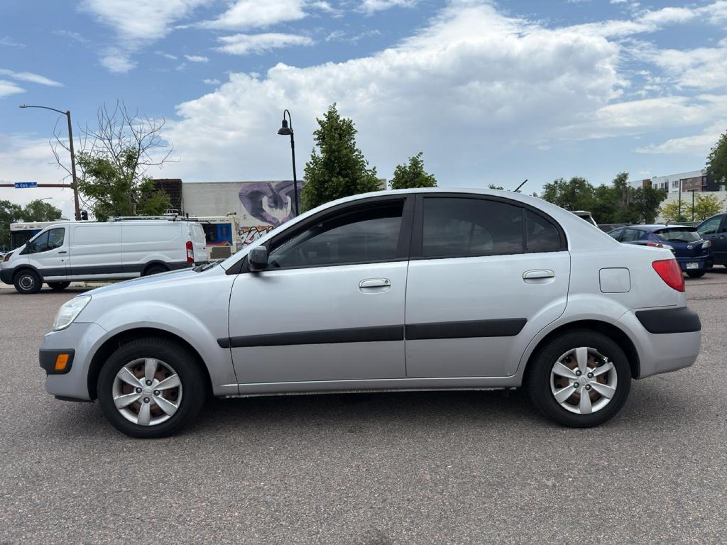 2008 SILVER Kia Rio BASE (KNADE123386) with an 4 Cyl, 1.6L engine, Manual transmission, located at 10890 W. Colfax Ave., Lakewood, CO, 80215, (303) 274-7692, 39.739914, -105.120132 - Discover the reliability and efficiency of this 2008 Kia Rio BASE, a perfect blend of practicality and performance. With its sleek design and compact build, this vehicle is ideal for city driving and easy maneuverability. Powered by a 4-cylinder, 1.6L engine, the Kia Rio offers a balanced mix of pow - Photo#7
