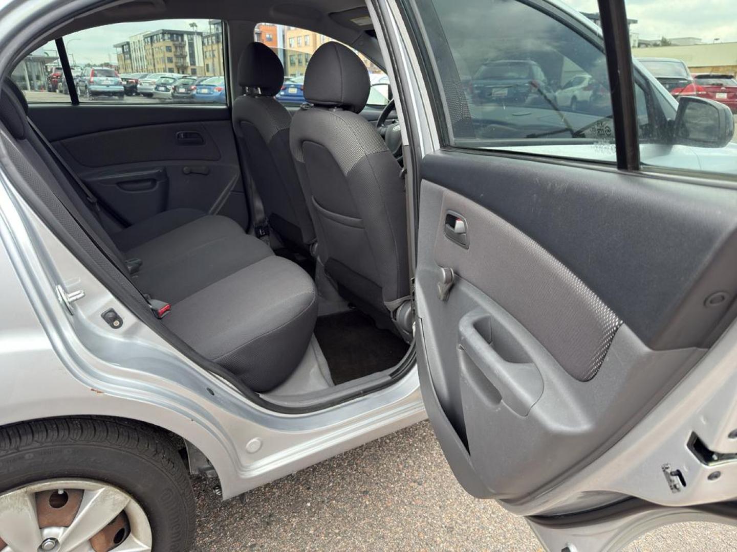 2008 SILVER Kia Rio BASE (KNADE123386) with an 4 Cyl, 1.6L engine, Manual transmission, located at 10890 W. Colfax Ave., Lakewood, CO, 80215, (303) 274-7692, 39.739914, -105.120132 - Discover the reliability and efficiency of this 2008 Kia Rio BASE, a perfect blend of practicality and performance. With its sleek design and compact build, this vehicle is ideal for city driving and easy maneuverability. Powered by a 4-cylinder, 1.6L engine, the Kia Rio offers a balanced mix of pow - Photo#10