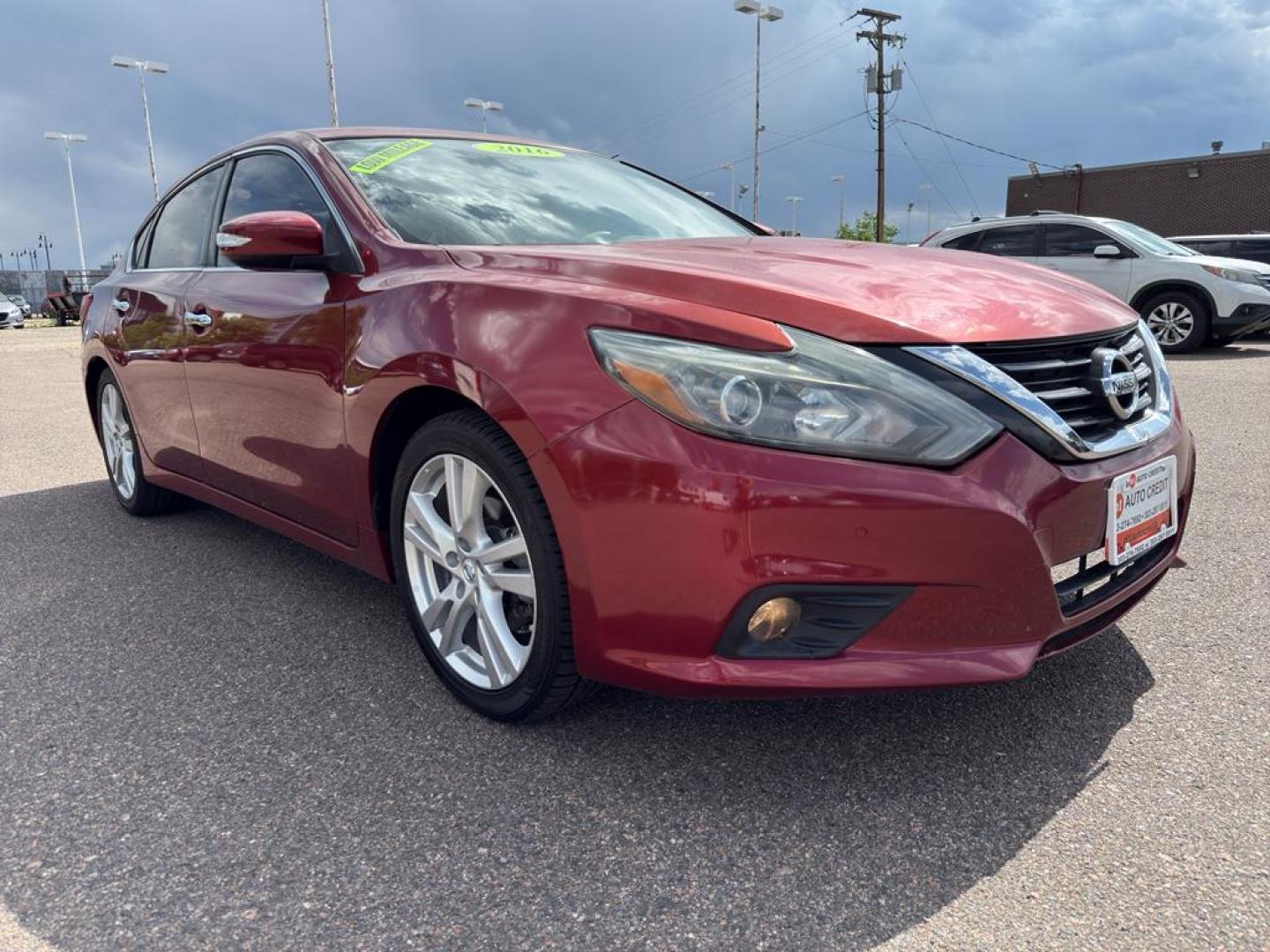 2016 RED Nissan Altima 3.5 S (1N4BL3AP5GC) with an V6, 3.5L engine, Automatic transmission, located at 10890 W. Colfax Ave., Lakewood, CO, 80215, (303) 274-7692, 39.739914, -105.120132 - Get ready to elevate your driving experience with this impressive 2016 Nissan Altima 3.5 S! This sleek sedan offers the perfect blend of power, style, and comfort, making it an exceptional choice for anyone seeking a reliable and thrilling ride. Under the hood, youll find a robust V6, 3.5L engine pa - Photo#2