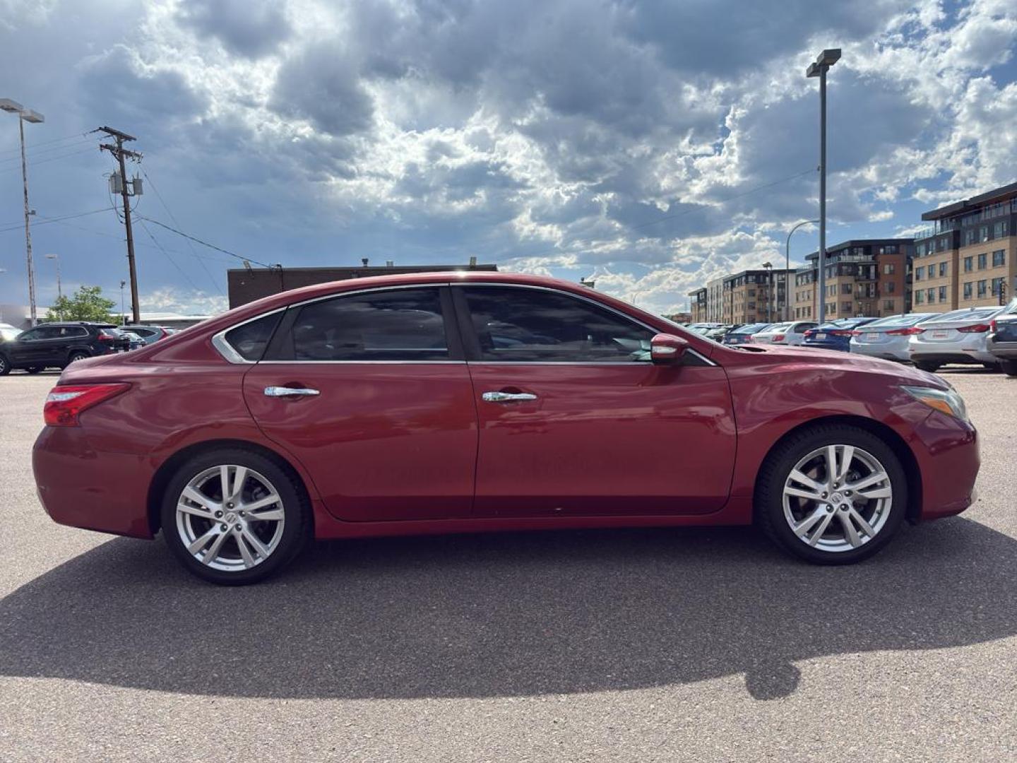 2016 RED Nissan Altima 3.5 S (1N4BL3AP5GC) with an V6, 3.5L engine, Automatic transmission, located at 10890 W. Colfax Ave., Lakewood, CO, 80215, (303) 274-7692, 39.739914, -105.120132 - Get ready to elevate your driving experience with this impressive 2016 Nissan Altima 3.5 S! This sleek sedan offers the perfect blend of power, style, and comfort, making it an exceptional choice for anyone seeking a reliable and thrilling ride. Under the hood, youll find a robust V6, 3.5L engine pa - Photo#3