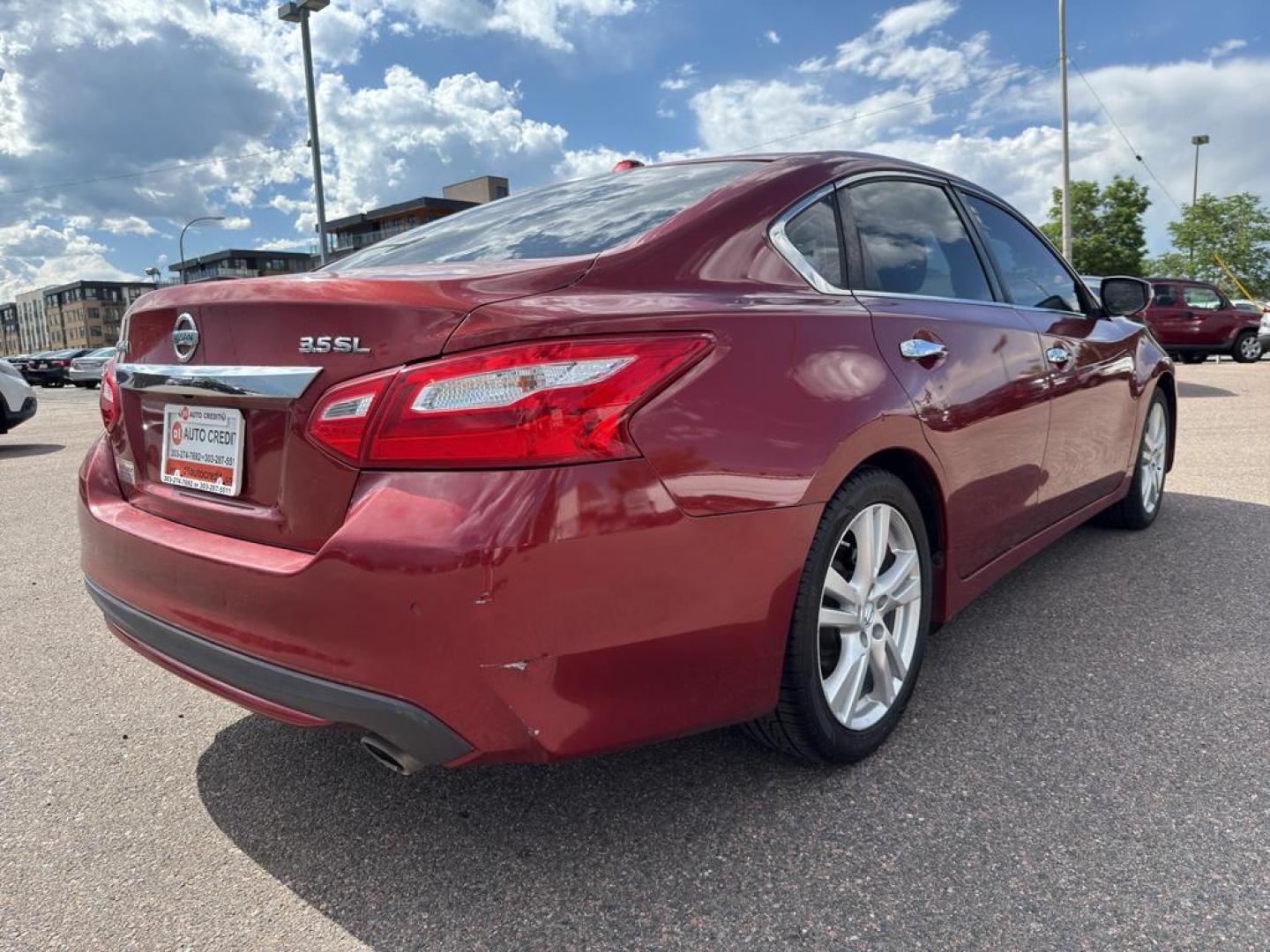 2016 RED Nissan Altima 3.5 S (1N4BL3AP5GC) with an V6, 3.5L engine, Automatic transmission, located at 10890 W. Colfax Ave., Lakewood, CO, 80215, (303) 274-7692, 39.739914, -105.120132 - Get ready to elevate your driving experience with this impressive 2016 Nissan Altima 3.5 S! This sleek sedan offers the perfect blend of power, style, and comfort, making it an exceptional choice for anyone seeking a reliable and thrilling ride. Under the hood, youll find a robust V6, 3.5L engine pa - Photo#4