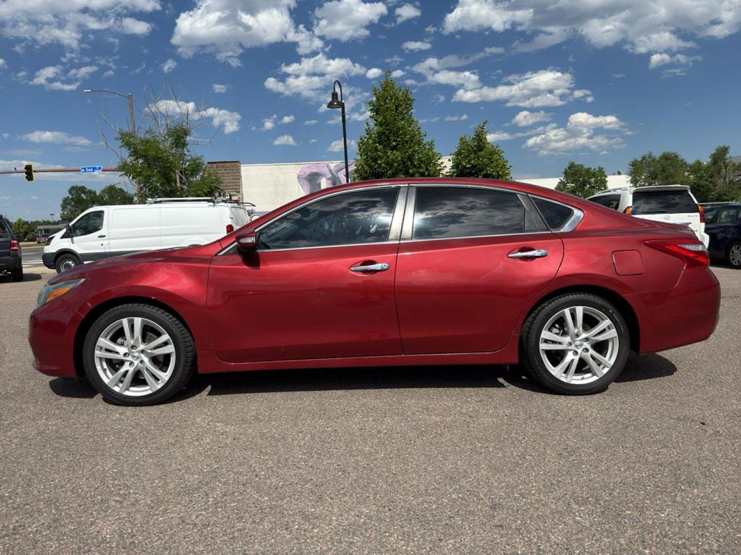 2016 RED Nissan Altima 3.5 S (1N4BL3AP5GC) with an V6, 3.5L engine, Automatic transmission, located at 10890 W. Colfax Ave., Lakewood, CO, 80215, (303) 274-7692, 39.739914, -105.120132 - Get ready to elevate your driving experience with this impressive 2016 Nissan Altima 3.5 S! This sleek sedan offers the perfect blend of power, style, and comfort, making it an exceptional choice for anyone seeking a reliable and thrilling ride. Under the hood, youll find a robust V6, 3.5L engine pa - Photo#7