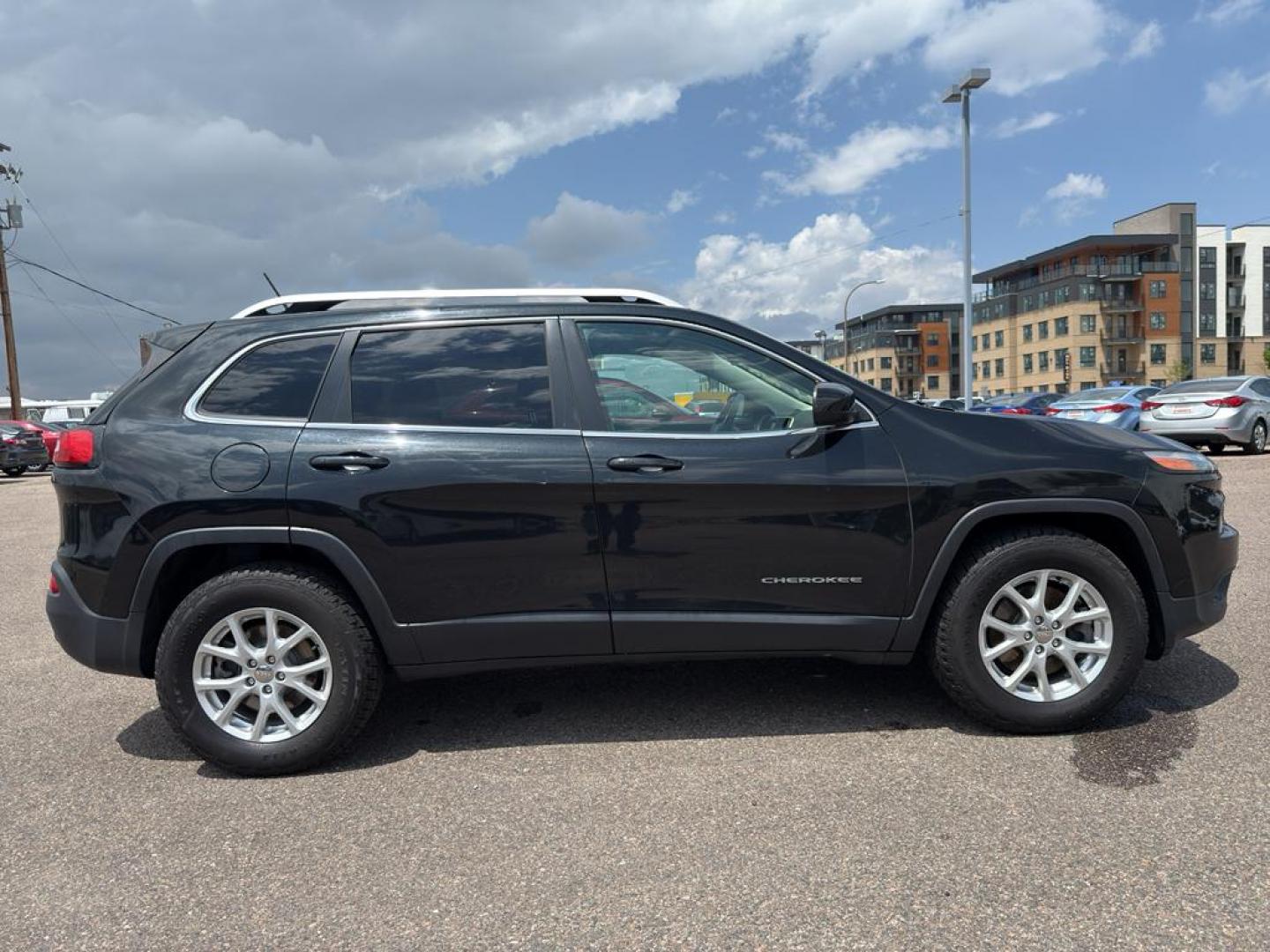 2014 BLACK Jeep Cherokee Latitude (1C4PJMCS5EW) with an V6, 3.2L engine, Automatic transmission, located at 10890 W. Colfax Ave., Lakewood, CO, 80215, (303) 274-7692, 39.739914, -105.120132 - Discover the ultimate blend of power, style, and versatility with this remarkable 2014 Jeep Cherokee Latitude! This impressive SUV is ready to conquer any terrain with its robust 4WD system and powerful V6, 3.2L engine, providing you with a thrilling driving experience every time you hit the road. W - Photo#3