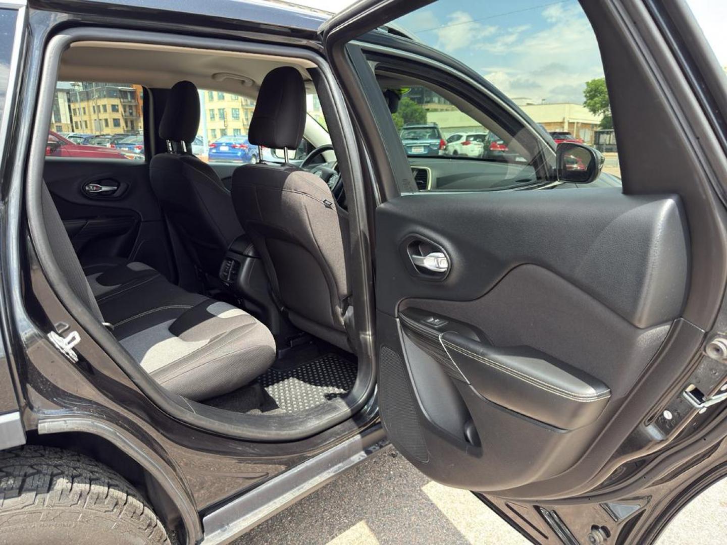 2014 BLACK Jeep Cherokee Latitude (1C4PJMCS5EW) with an V6, 3.2L engine, Automatic transmission, located at 10890 W. Colfax Ave., Lakewood, CO, 80215, (303) 274-7692, 39.739914, -105.120132 - Discover the ultimate blend of power, style, and versatility with this remarkable 2014 Jeep Cherokee Latitude! This impressive SUV is ready to conquer any terrain with its robust 4WD system and powerful V6, 3.2L engine, providing you with a thrilling driving experience every time you hit the road. W - Photo#10