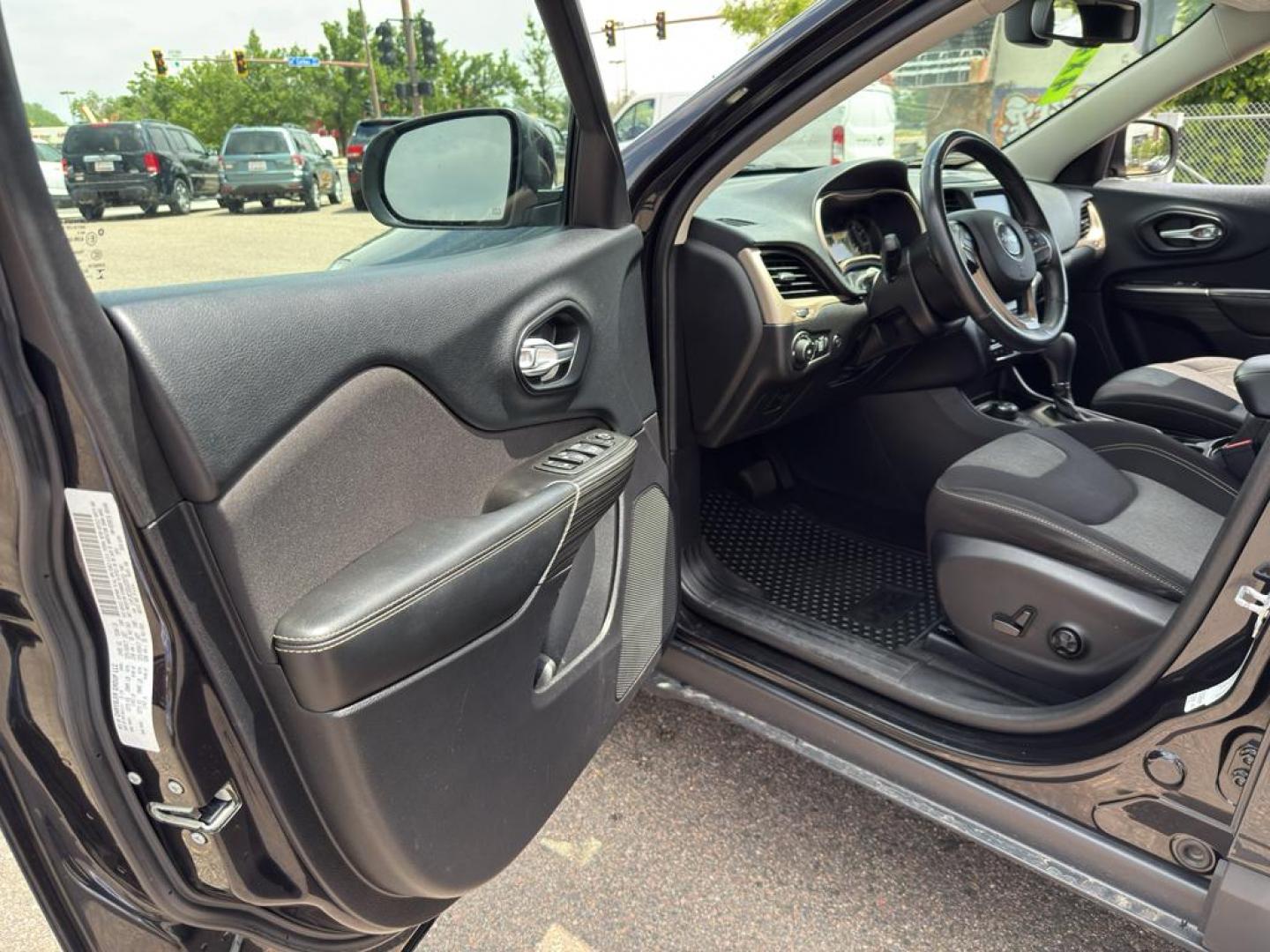 2014 BLACK Jeep Cherokee Latitude (1C4PJMCS5EW) with an V6, 3.2L engine, Automatic transmission, located at 10890 W. Colfax Ave., Lakewood, CO, 80215, (303) 274-7692, 39.739914, -105.120132 - Discover the ultimate blend of power, style, and versatility with this remarkable 2014 Jeep Cherokee Latitude! This impressive SUV is ready to conquer any terrain with its robust 4WD system and powerful V6, 3.2L engine, providing you with a thrilling driving experience every time you hit the road. W - Photo#16