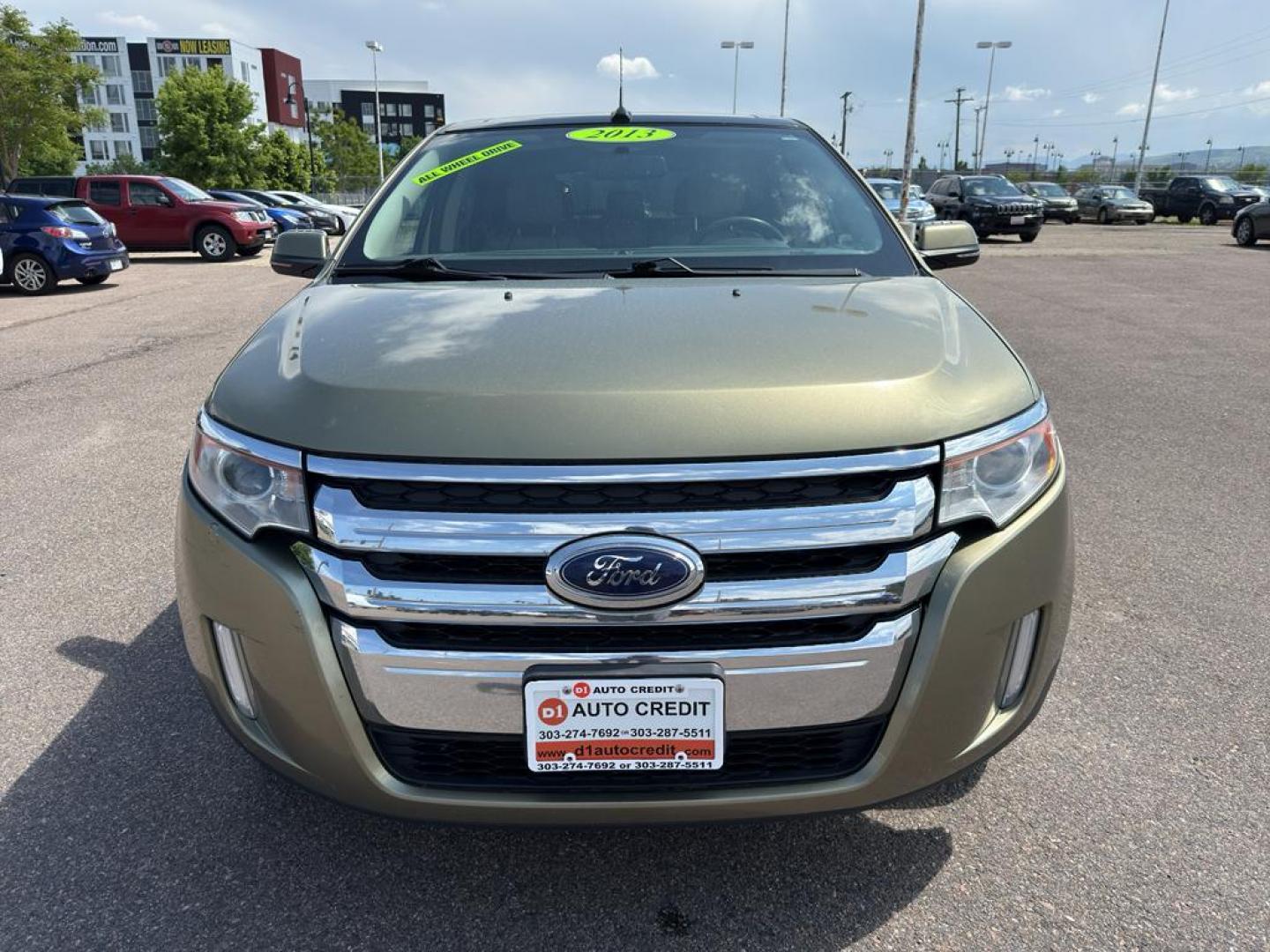2013 GOLD Ford Edge SEL (2FMDK4JC0DB) with an V6, 3.5L engine, Automatic transmission, located at 10890 W. Colfax Ave., Lakewood, CO, 80215, (303) 274-7692, 39.739914, -105.120132 - Discover the perfect blend of performance and comfort with this 2013 Ford Edge SEL, featuring the confidence of All-Wheel Drive and powered by a robust 3.5L V6 engine. This exceptional vehicle offers a smooth and dynamic driving experience, making it an ideal choice for both city commutes and weeken - Photo#1