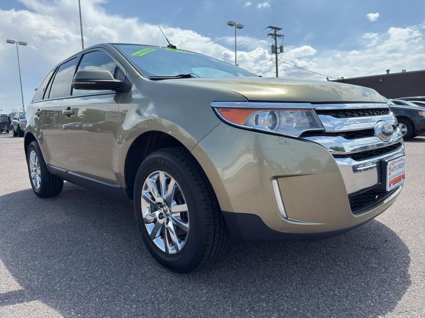 2013 GOLD Ford Edge SEL (2FMDK4JC0DB) with an V6, 3.5L engine, Automatic transmission, located at 10890 W. Colfax Ave., Lakewood, CO, 80215, (303) 274-7692, 39.739914, -105.120132 - Discover the perfect blend of performance and comfort with this 2013 Ford Edge SEL, featuring the confidence of All-Wheel Drive and powered by a robust 3.5L V6 engine. This exceptional vehicle offers a smooth and dynamic driving experience, making it an ideal choice for both city commutes and weeken - Photo#2