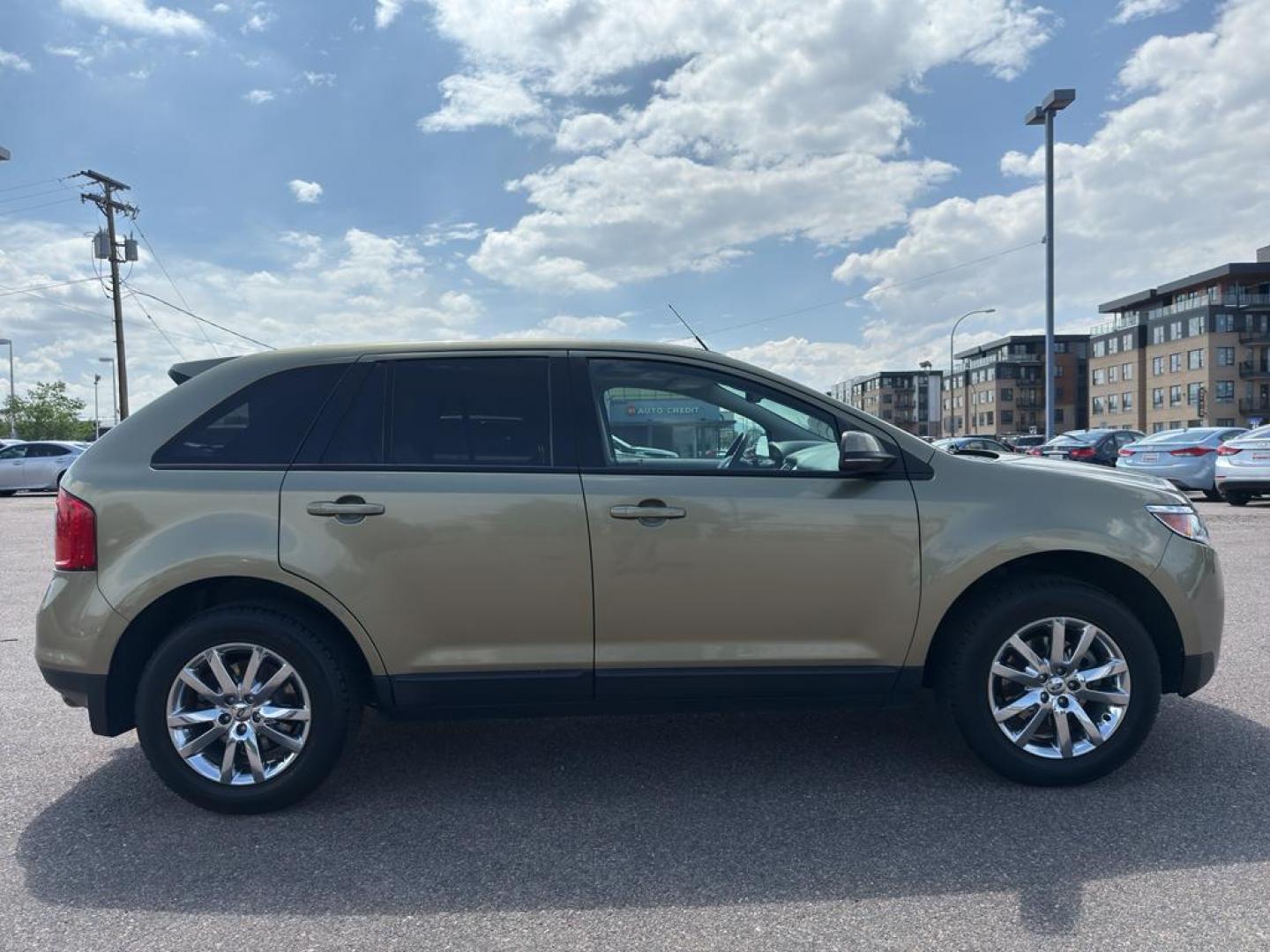 2013 GOLD Ford Edge SEL (2FMDK4JC0DB) with an V6, 3.5L engine, Automatic transmission, located at 10890 W. Colfax Ave., Lakewood, CO, 80215, (303) 274-7692, 39.739914, -105.120132 - Discover the perfect blend of performance and comfort with this 2013 Ford Edge SEL, featuring the confidence of All-Wheel Drive and powered by a robust 3.5L V6 engine. This exceptional vehicle offers a smooth and dynamic driving experience, making it an ideal choice for both city commutes and weeken - Photo#3