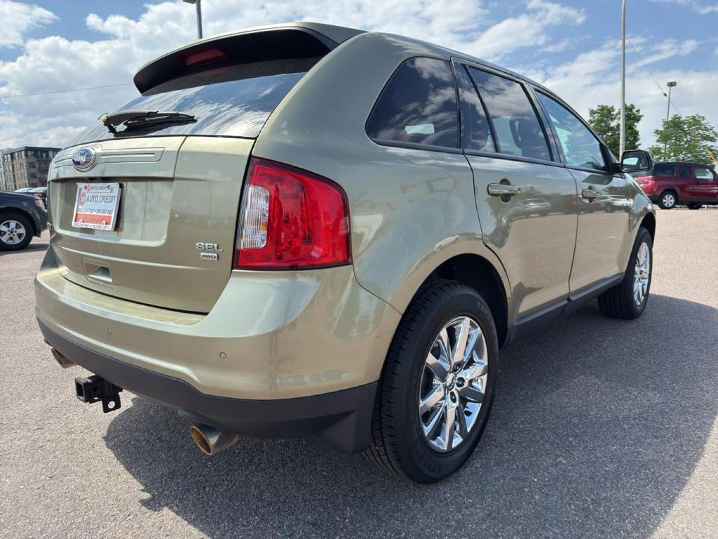 2013 GOLD Ford Edge SEL (2FMDK4JC0DB) with an V6, 3.5L engine, Automatic transmission, located at 10890 W. Colfax Ave., Lakewood, CO, 80215, (303) 274-7692, 39.739914, -105.120132 - Discover the perfect blend of performance and comfort with this 2013 Ford Edge SEL, featuring the confidence of All-Wheel Drive and powered by a robust 3.5L V6 engine. This exceptional vehicle offers a smooth and dynamic driving experience, making it an ideal choice for both city commutes and weeken - Photo#4