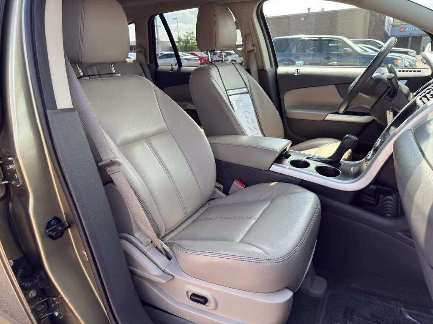 2013 GOLD Ford Edge SEL (2FMDK4JC0DB) with an V6, 3.5L engine, Automatic transmission, located at 10890 W. Colfax Ave., Lakewood, CO, 80215, (303) 274-7692, 39.739914, -105.120132 - Discover the perfect blend of performance and comfort with this 2013 Ford Edge SEL, featuring the confidence of All-Wheel Drive and powered by a robust 3.5L V6 engine. This exceptional vehicle offers a smooth and dynamic driving experience, making it an ideal choice for both city commutes and weeken - Photo#9