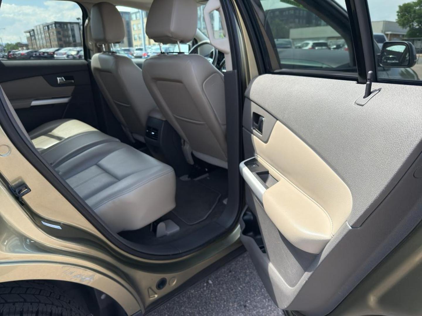 2013 GOLD Ford Edge SEL (2FMDK4JC0DB) with an V6, 3.5L engine, Automatic transmission, located at 10890 W. Colfax Ave., Lakewood, CO, 80215, (303) 274-7692, 39.739914, -105.120132 - Discover the perfect blend of performance and comfort with this 2013 Ford Edge SEL, featuring the confidence of All-Wheel Drive and powered by a robust 3.5L V6 engine. This exceptional vehicle offers a smooth and dynamic driving experience, making it an ideal choice for both city commutes and weeken - Photo#10