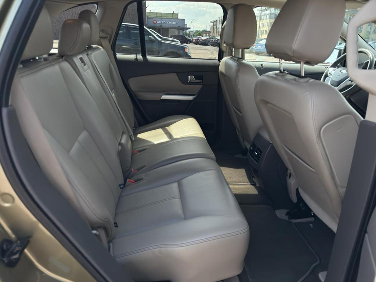 2013 GOLD Ford Edge SEL (2FMDK4JC0DB) with an V6, 3.5L engine, Automatic transmission, located at 10890 W. Colfax Ave., Lakewood, CO, 80215, (303) 274-7692, 39.739914, -105.120132 - Discover the perfect blend of performance and comfort with this 2013 Ford Edge SEL, featuring the confidence of All-Wheel Drive and powered by a robust 3.5L V6 engine. This exceptional vehicle offers a smooth and dynamic driving experience, making it an ideal choice for both city commutes and weeken - Photo#11