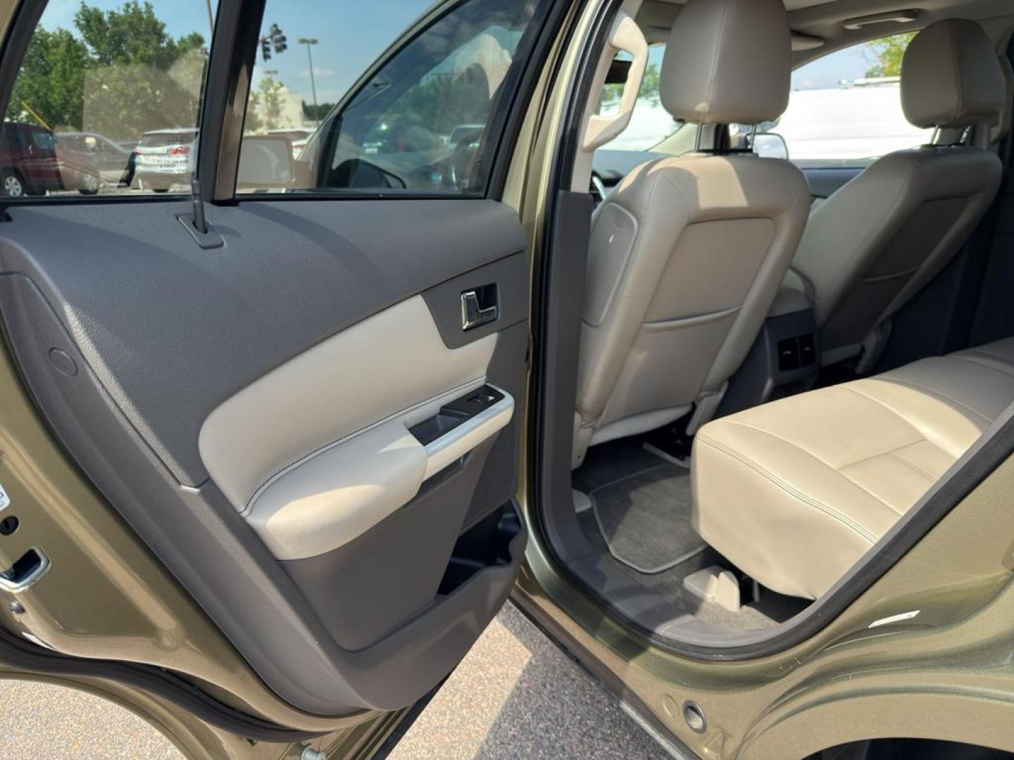 2013 GOLD Ford Edge SEL (2FMDK4JC0DB) with an V6, 3.5L engine, Automatic transmission, located at 10890 W. Colfax Ave., Lakewood, CO, 80215, (303) 274-7692, 39.739914, -105.120132 - Discover the perfect blend of performance and comfort with this 2013 Ford Edge SEL, featuring the confidence of All-Wheel Drive and powered by a robust 3.5L V6 engine. This exceptional vehicle offers a smooth and dynamic driving experience, making it an ideal choice for both city commutes and weeken - Photo#13