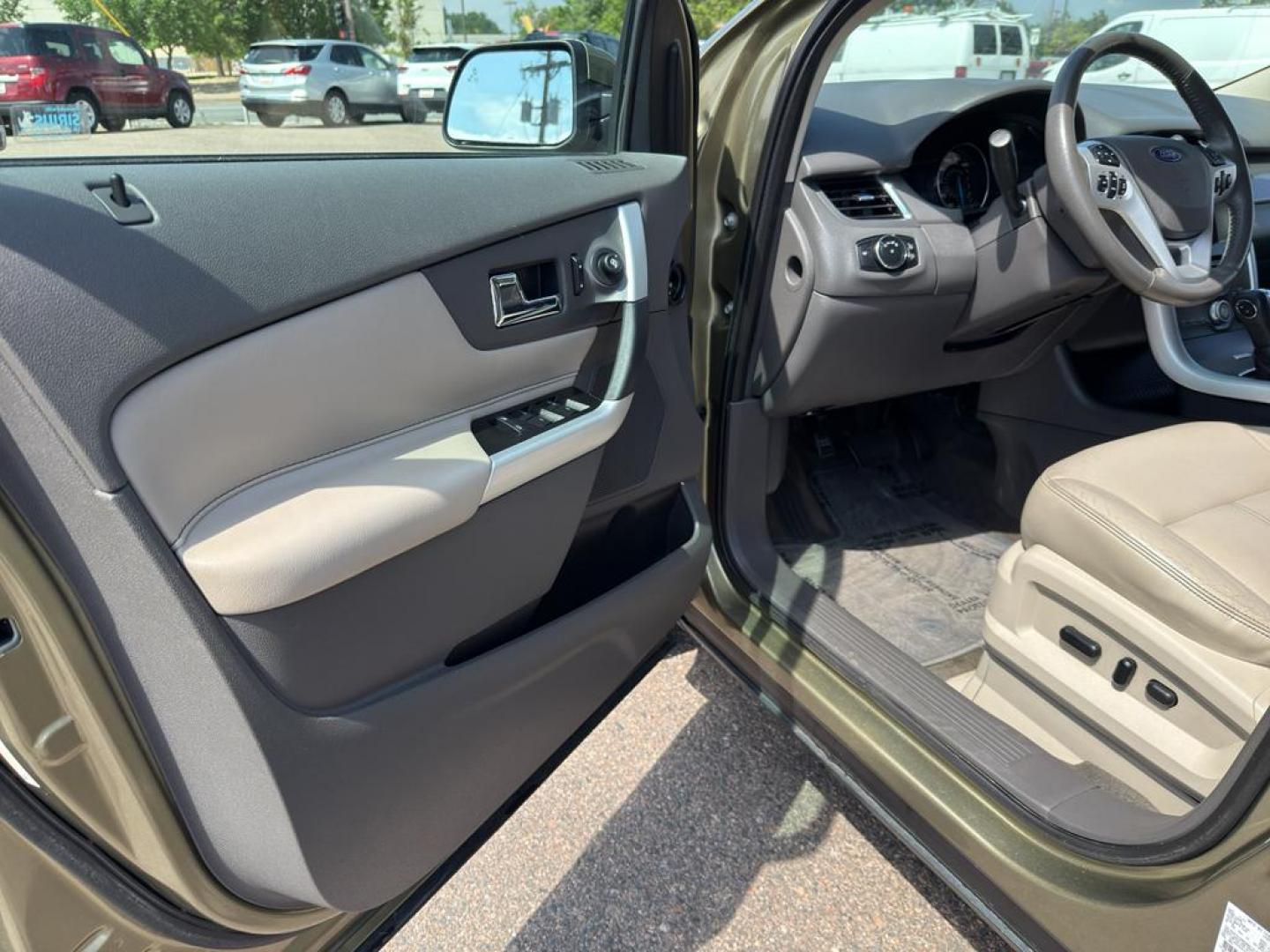 2013 GOLD Ford Edge SEL (2FMDK4JC0DB) with an V6, 3.5L engine, Automatic transmission, located at 10890 W. Colfax Ave., Lakewood, CO, 80215, (303) 274-7692, 39.739914, -105.120132 - Discover the perfect blend of performance and comfort with this 2013 Ford Edge SEL, featuring the confidence of All-Wheel Drive and powered by a robust 3.5L V6 engine. This exceptional vehicle offers a smooth and dynamic driving experience, making it an ideal choice for both city commutes and weeken - Photo#15
