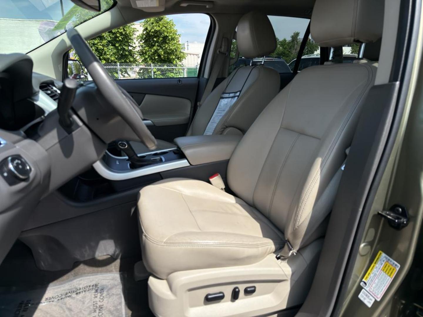2013 GOLD Ford Edge SEL (2FMDK4JC0DB) with an V6, 3.5L engine, Automatic transmission, located at 10890 W. Colfax Ave., Lakewood, CO, 80215, (303) 274-7692, 39.739914, -105.120132 - Discover the perfect blend of performance and comfort with this 2013 Ford Edge SEL, featuring the confidence of All-Wheel Drive and powered by a robust 3.5L V6 engine. This exceptional vehicle offers a smooth and dynamic driving experience, making it an ideal choice for both city commutes and weeken - Photo#16