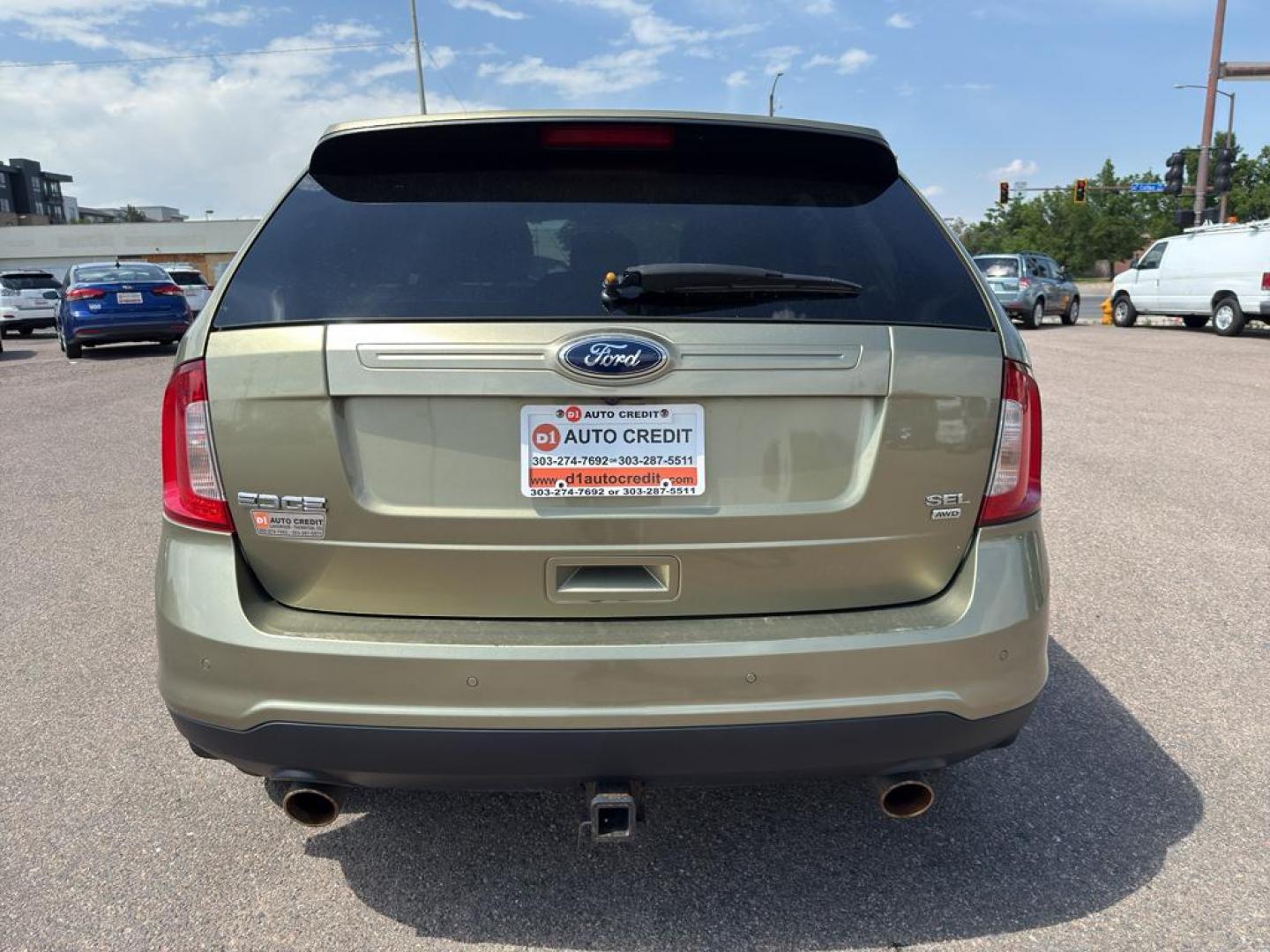 2013 GOLD Ford Edge SEL (2FMDK4JC0DB) with an V6, 3.5L engine, Automatic transmission, located at 10890 W. Colfax Ave., Lakewood, CO, 80215, (303) 274-7692, 39.739914, -105.120132 - Discover the perfect blend of performance and comfort with this 2013 Ford Edge SEL, featuring the confidence of All-Wheel Drive and powered by a robust 3.5L V6 engine. This exceptional vehicle offers a smooth and dynamic driving experience, making it an ideal choice for both city commutes and weeken - Photo#5