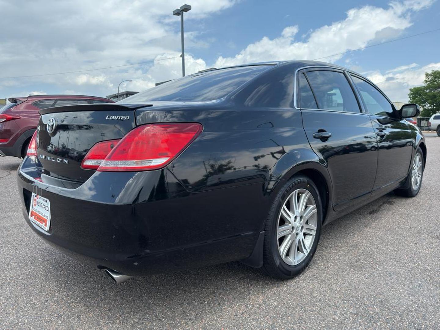 2006 BLACK Toyota Avalon LIMITED (4T1BK36BX6U) with an V6, 3.5L engine, Automatic transmission, located at 10890 W. Colfax Ave., Lakewood, CO, 80215, (303) 274-7692, 39.739914, -105.120132 - Discover the perfect blend of luxury, performance, and reliability with this stunning 2006 Toyota Avalon Limited! This exceptional sedan is designed to elevate your driving experience with its sophisticated features and powerful performance. Under the hood, you'll find a robust V6, 3.5L engine that - Photo#4