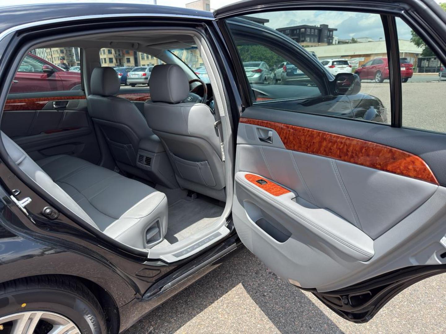 2006 BLACK Toyota Avalon LIMITED (4T1BK36BX6U) with an V6, 3.5L engine, Automatic transmission, located at 10890 W. Colfax Ave., Lakewood, CO, 80215, (303) 274-7692, 39.739914, -105.120132 - Discover the perfect blend of luxury, performance, and reliability with this stunning 2006 Toyota Avalon Limited! This exceptional sedan is designed to elevate your driving experience with its sophisticated features and powerful performance. Under the hood, you'll find a robust V6, 3.5L engine that - Photo#10