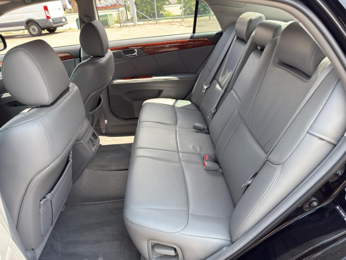 2006 BLACK Toyota Avalon LIMITED (4T1BK36BX6U) with an V6, 3.5L engine, Automatic transmission, located at 10890 W. Colfax Ave., Lakewood, CO, 80215, (303) 274-7692, 39.739914, -105.120132 - Discover the perfect blend of luxury, performance, and reliability with this stunning 2006 Toyota Avalon Limited! This exceptional sedan is designed to elevate your driving experience with its sophisticated features and powerful performance. Under the hood, you'll find a robust V6, 3.5L engine that - Photo#13