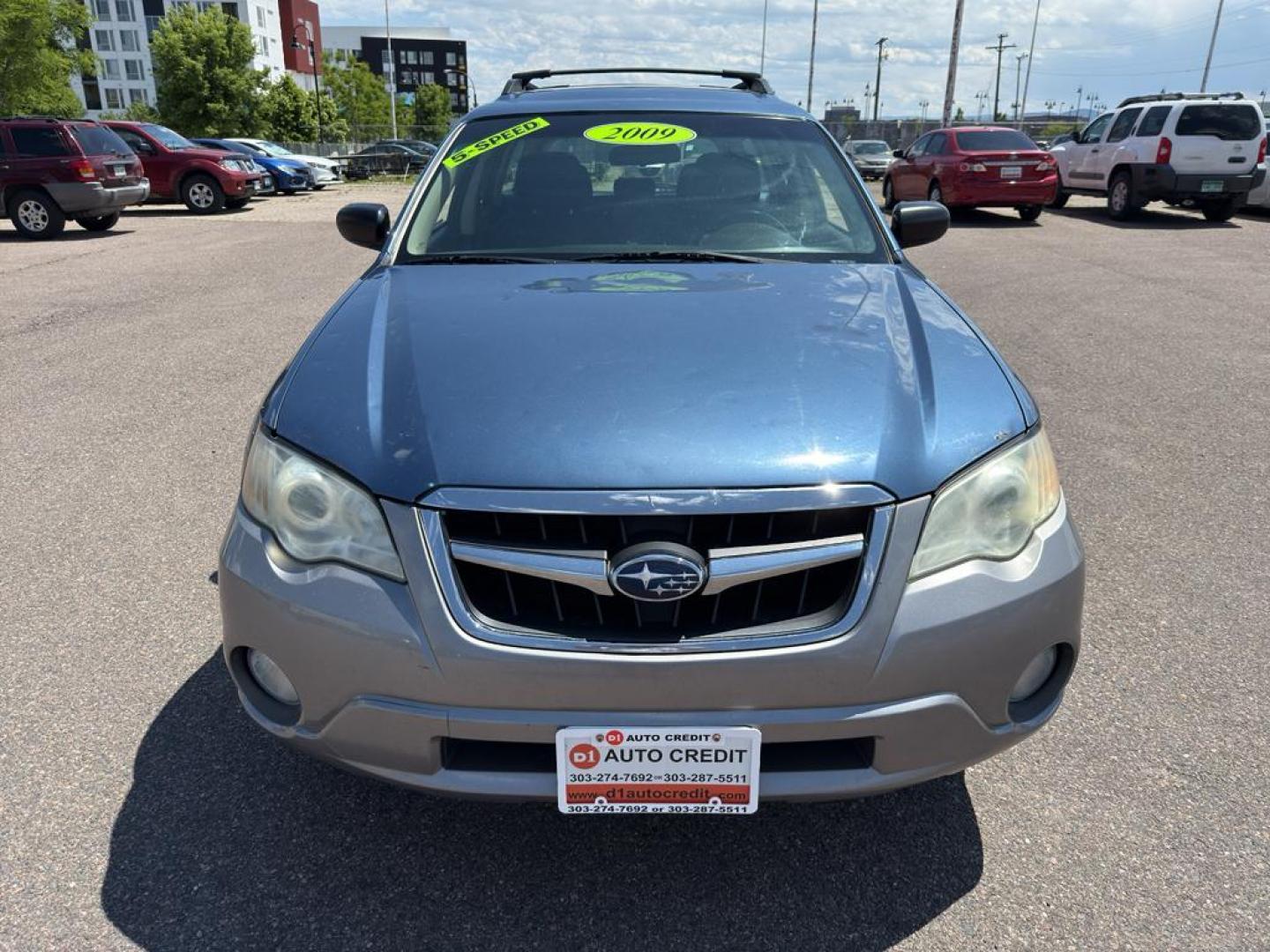 2009 BLUE Subaru Outback i (4S4BP61C896) with an 4 Cyl, 2.5L engine, Manual transmission, located at 10890 W. Colfax Ave., Lakewood, CO, 80215, (303) 274-7692, 39.739914, -105.120132 - For those seeking reliability and performance, look no further than this 2009 Subaru Outback i with All-Wheel Drive. This versatile vehicle is perfect for tackling diverse road conditions, making it an ideal choice for both city driving and outdoor adventures. Equipped with a fuel-efficient 4-cylind - Photo#1