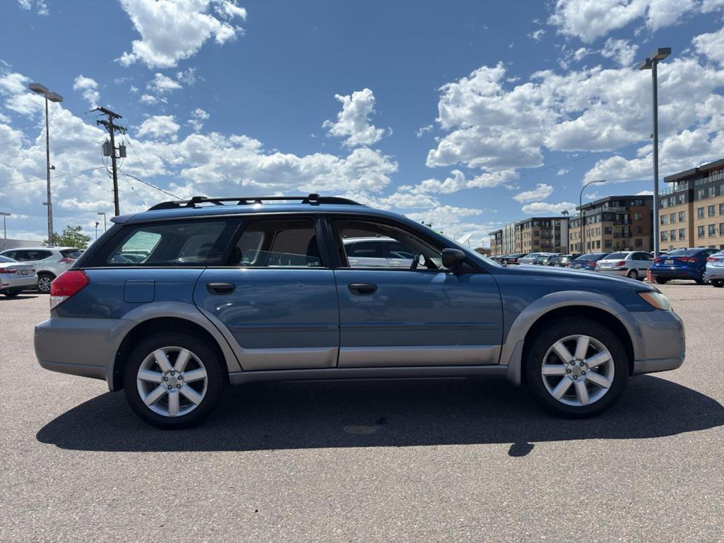 2009 BLUE Subaru Outback i (4S4BP61C896) with an 4 Cyl, 2.5L engine, Manual transmission, located at 10890 W. Colfax Ave., Lakewood, CO, 80215, (303) 274-7692, 39.739914, -105.120132 - For those seeking reliability and performance, look no further than this 2009 Subaru Outback i with All-Wheel Drive. This versatile vehicle is perfect for tackling diverse road conditions, making it an ideal choice for both city driving and outdoor adventures. Equipped with a fuel-efficient 4-cylind - Photo#3