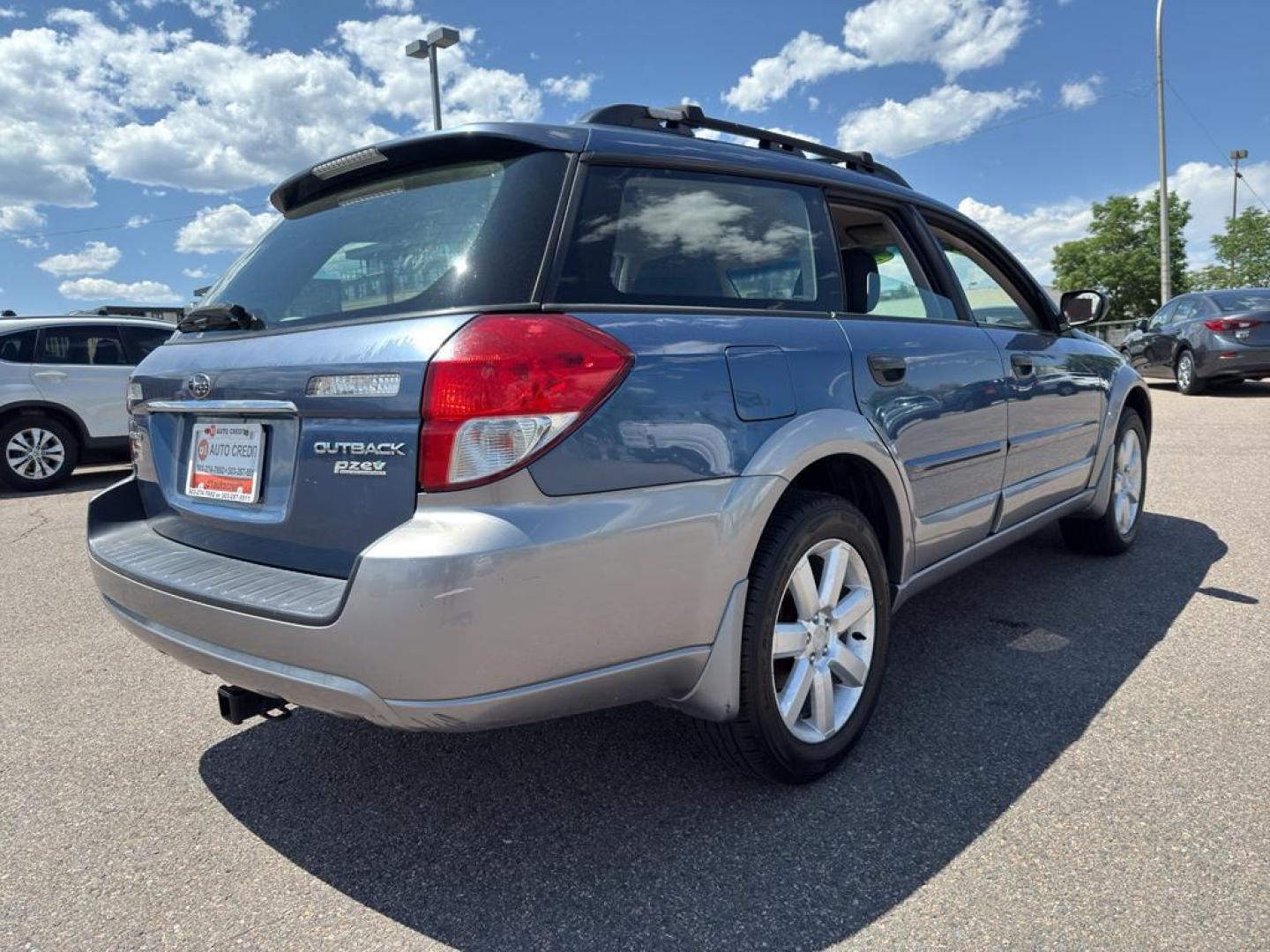 2009 BLUE Subaru Outback i (4S4BP61C896) with an 4 Cyl, 2.5L engine, Manual transmission, located at 10890 W. Colfax Ave., Lakewood, CO, 80215, (303) 274-7692, 39.739914, -105.120132 - For those seeking reliability and performance, look no further than this 2009 Subaru Outback i with All-Wheel Drive. This versatile vehicle is perfect for tackling diverse road conditions, making it an ideal choice for both city driving and outdoor adventures. Equipped with a fuel-efficient 4-cylind - Photo#4
