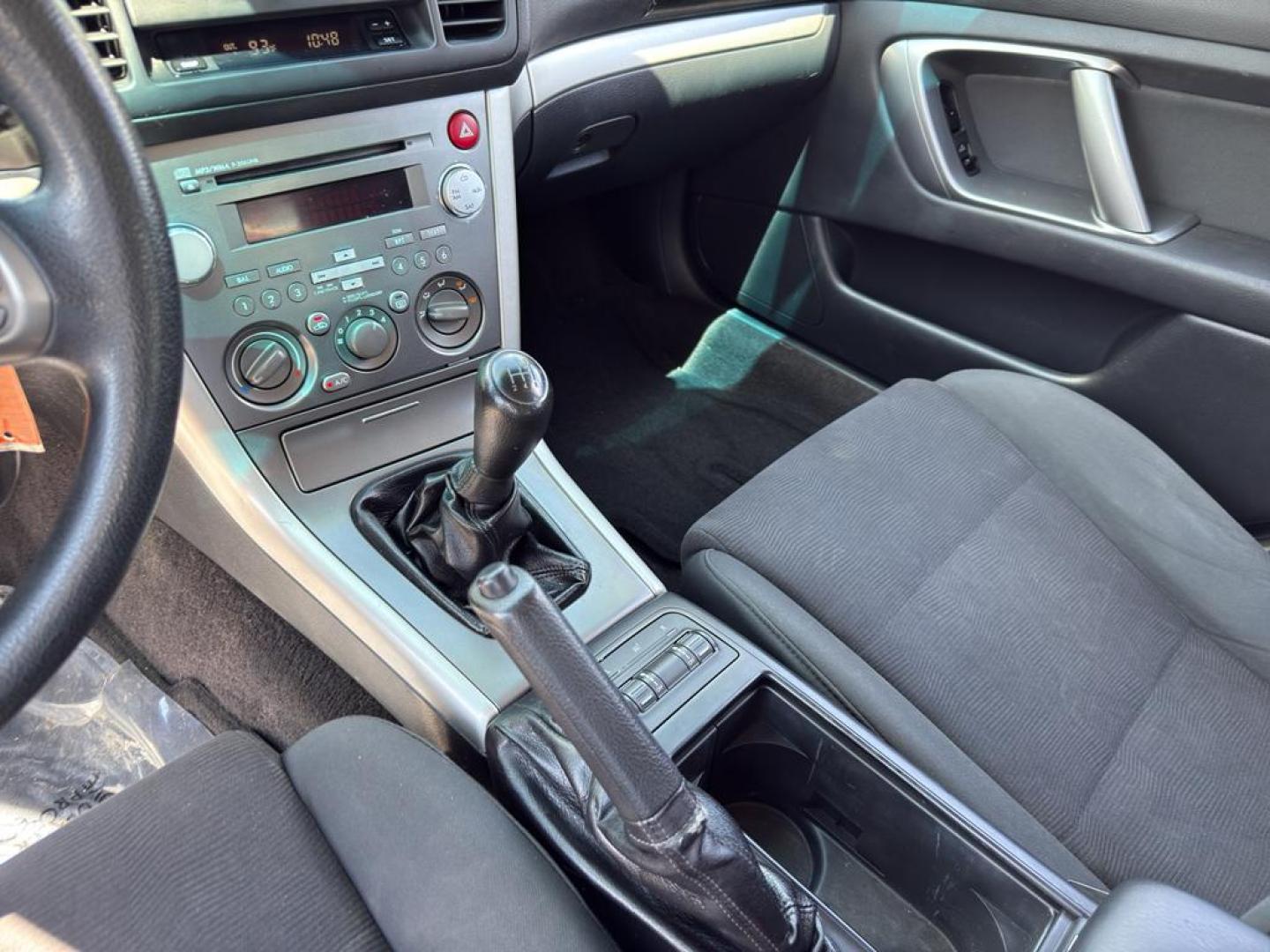 2009 BLUE Subaru Outback i (4S4BP61C896) with an 4 Cyl, 2.5L engine, Manual transmission, located at 10890 W. Colfax Ave., Lakewood, CO, 80215, (303) 274-7692, 39.739914, -105.120132 - For those seeking reliability and performance, look no further than this 2009 Subaru Outback i with All-Wheel Drive. This versatile vehicle is perfect for tackling diverse road conditions, making it an ideal choice for both city driving and outdoor adventures. Equipped with a fuel-efficient 4-cylind - Photo#11