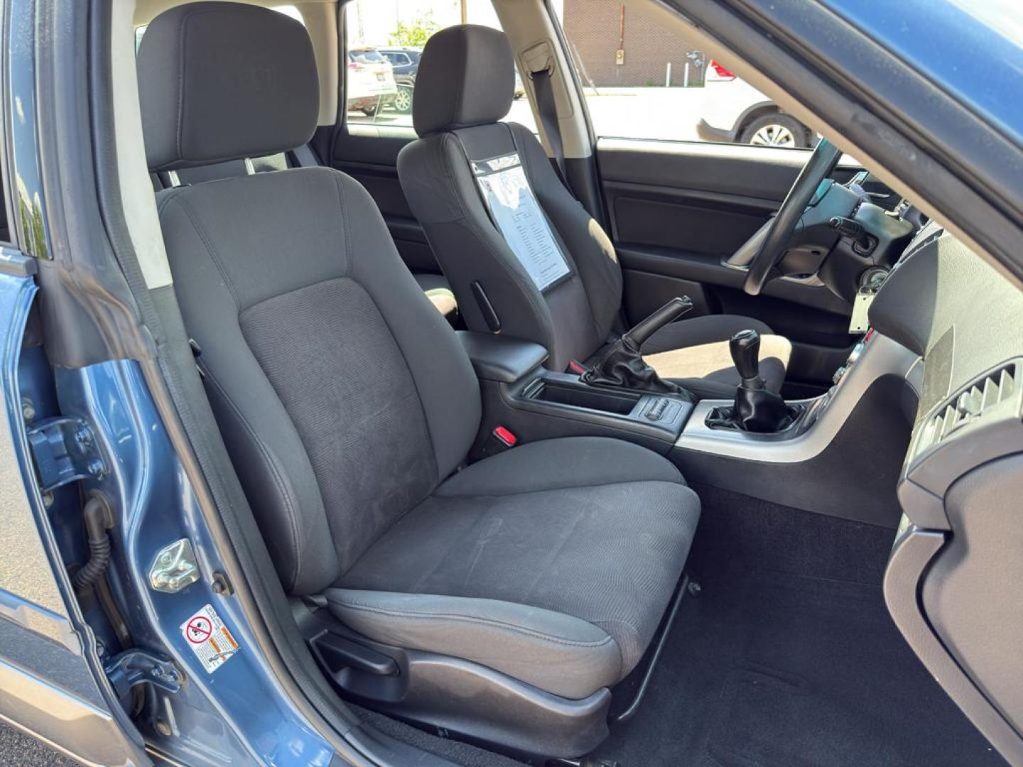 2009 BLUE Subaru Outback i (4S4BP61C896) with an 4 Cyl, 2.5L engine, Manual transmission, located at 10890 W. Colfax Ave., Lakewood, CO, 80215, (303) 274-7692, 39.739914, -105.120132 - For those seeking reliability and performance, look no further than this 2009 Subaru Outback i with All-Wheel Drive. This versatile vehicle is perfect for tackling diverse road conditions, making it an ideal choice for both city driving and outdoor adventures. Equipped with a fuel-efficient 4-cylind - Photo#13
