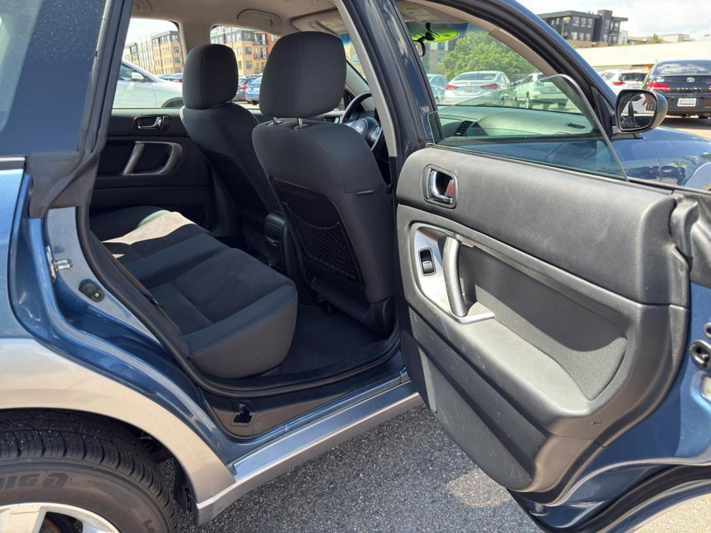 2009 BLUE Subaru Outback i (4S4BP61C896) with an 4 Cyl, 2.5L engine, Manual transmission, located at 10890 W. Colfax Ave., Lakewood, CO, 80215, (303) 274-7692, 39.739914, -105.120132 - For those seeking reliability and performance, look no further than this 2009 Subaru Outback i with All-Wheel Drive. This versatile vehicle is perfect for tackling diverse road conditions, making it an ideal choice for both city driving and outdoor adventures. Equipped with a fuel-efficient 4-cylind - Photo#14