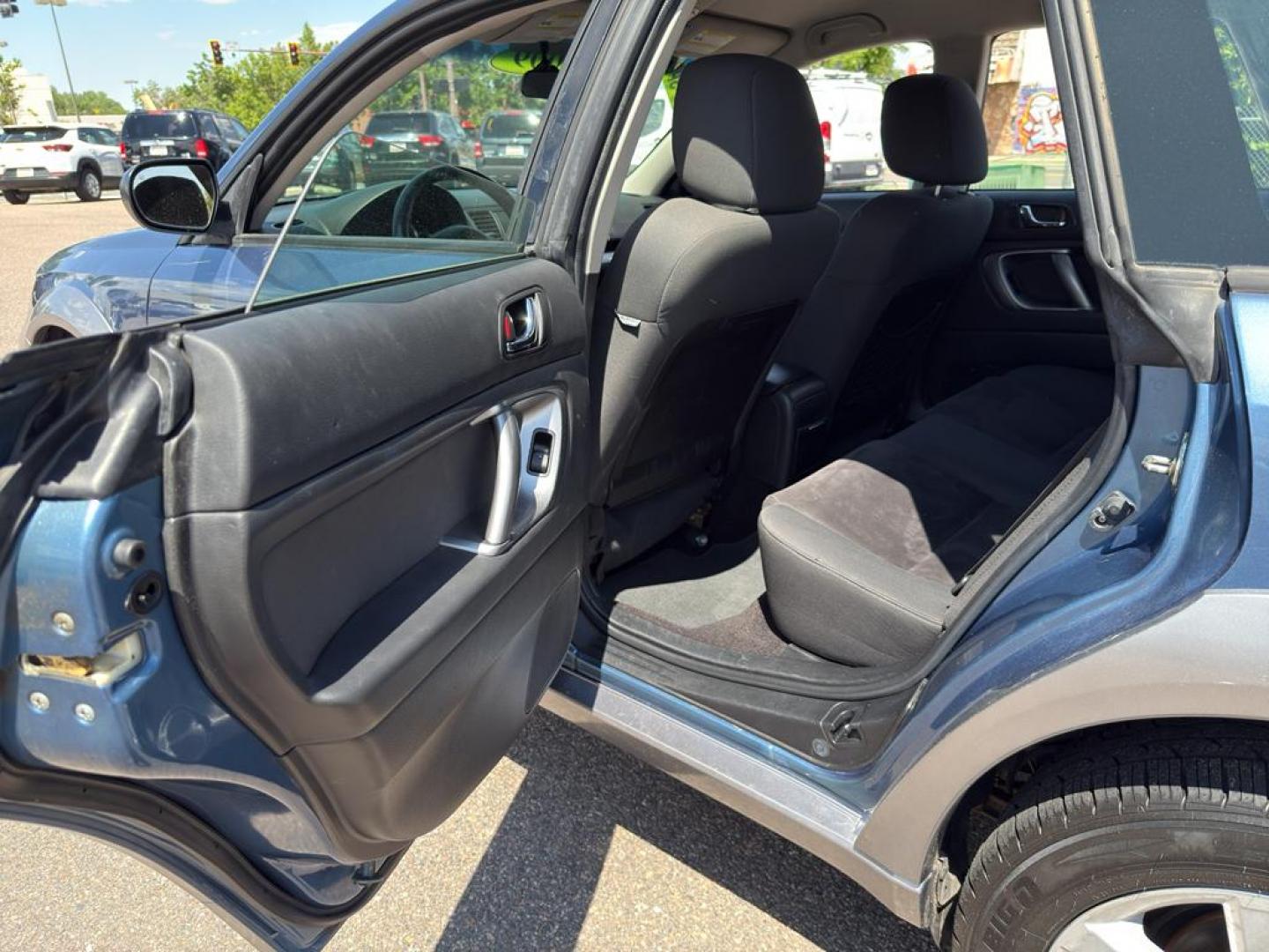 2009 BLUE Subaru Outback i (4S4BP61C896) with an 4 Cyl, 2.5L engine, Manual transmission, located at 10890 W. Colfax Ave., Lakewood, CO, 80215, (303) 274-7692, 39.739914, -105.120132 - For those seeking reliability and performance, look no further than this 2009 Subaru Outback i with All-Wheel Drive. This versatile vehicle is perfect for tackling diverse road conditions, making it an ideal choice for both city driving and outdoor adventures. Equipped with a fuel-efficient 4-cylind - Photo#17