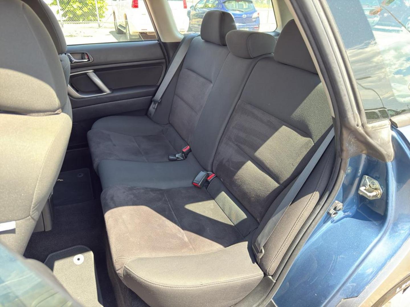 2009 BLUE Subaru Outback i (4S4BP61C896) with an 4 Cyl, 2.5L engine, Manual transmission, located at 10890 W. Colfax Ave., Lakewood, CO, 80215, (303) 274-7692, 39.739914, -105.120132 - For those seeking reliability and performance, look no further than this 2009 Subaru Outback i with All-Wheel Drive. This versatile vehicle is perfect for tackling diverse road conditions, making it an ideal choice for both city driving and outdoor adventures. Equipped with a fuel-efficient 4-cylind - Photo#18