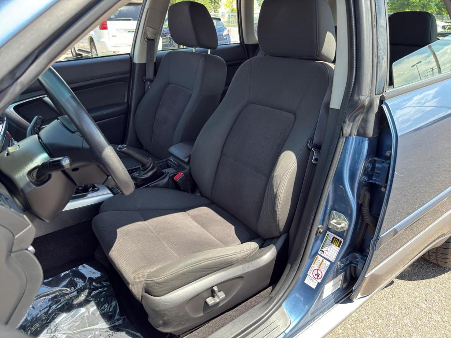 2009 BLUE Subaru Outback i (4S4BP61C896) with an 4 Cyl, 2.5L engine, Manual transmission, located at 10890 W. Colfax Ave., Lakewood, CO, 80215, (303) 274-7692, 39.739914, -105.120132 - For those seeking reliability and performance, look no further than this 2009 Subaru Outback i with All-Wheel Drive. This versatile vehicle is perfect for tackling diverse road conditions, making it an ideal choice for both city driving and outdoor adventures. Equipped with a fuel-efficient 4-cylind - Photo#20