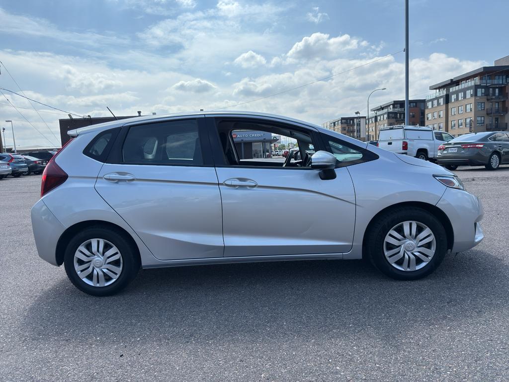 2015 SILVER Honda Fit LX (3HGGK5G52FM) with an 4 Cyl, 1.5L engine, Manual 6-Speed transmission, located at 10890 W. Colfax Ave., Lakewood, CO, 80215, (303) 274-7692, 39.739914, -105.120132 - Photo#3