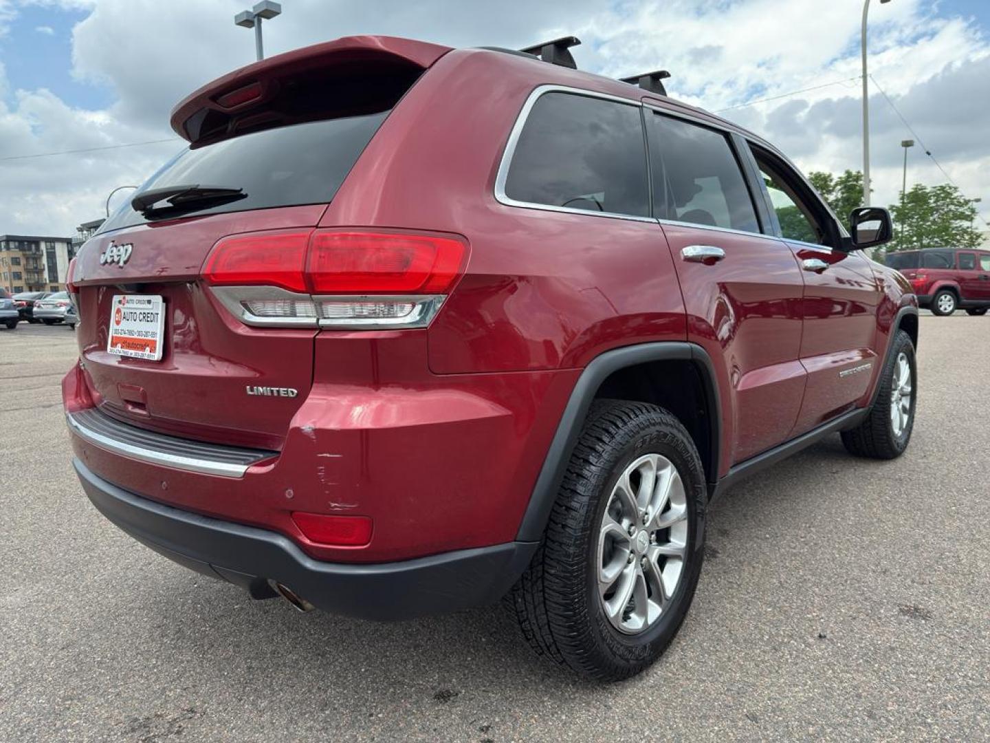 2014 RED Jeep Grand Cherokee Limited (1C4RJFBG0EC) with an V6, 3.6L engine, Automatic transmission, located at 10890 W. Colfax Ave., Lakewood, CO, 80215, (303) 274-7692, 39.739914, -105.120132 - Photo#4