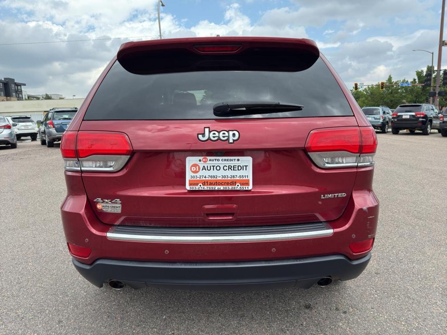 2014 RED Jeep Grand Cherokee Limited (1C4RJFBG0EC) with an V6, 3.6L engine, Automatic transmission, located at 10890 W. Colfax Ave., Lakewood, CO, 80215, (303) 274-7692, 39.739914, -105.120132 - Photo#5