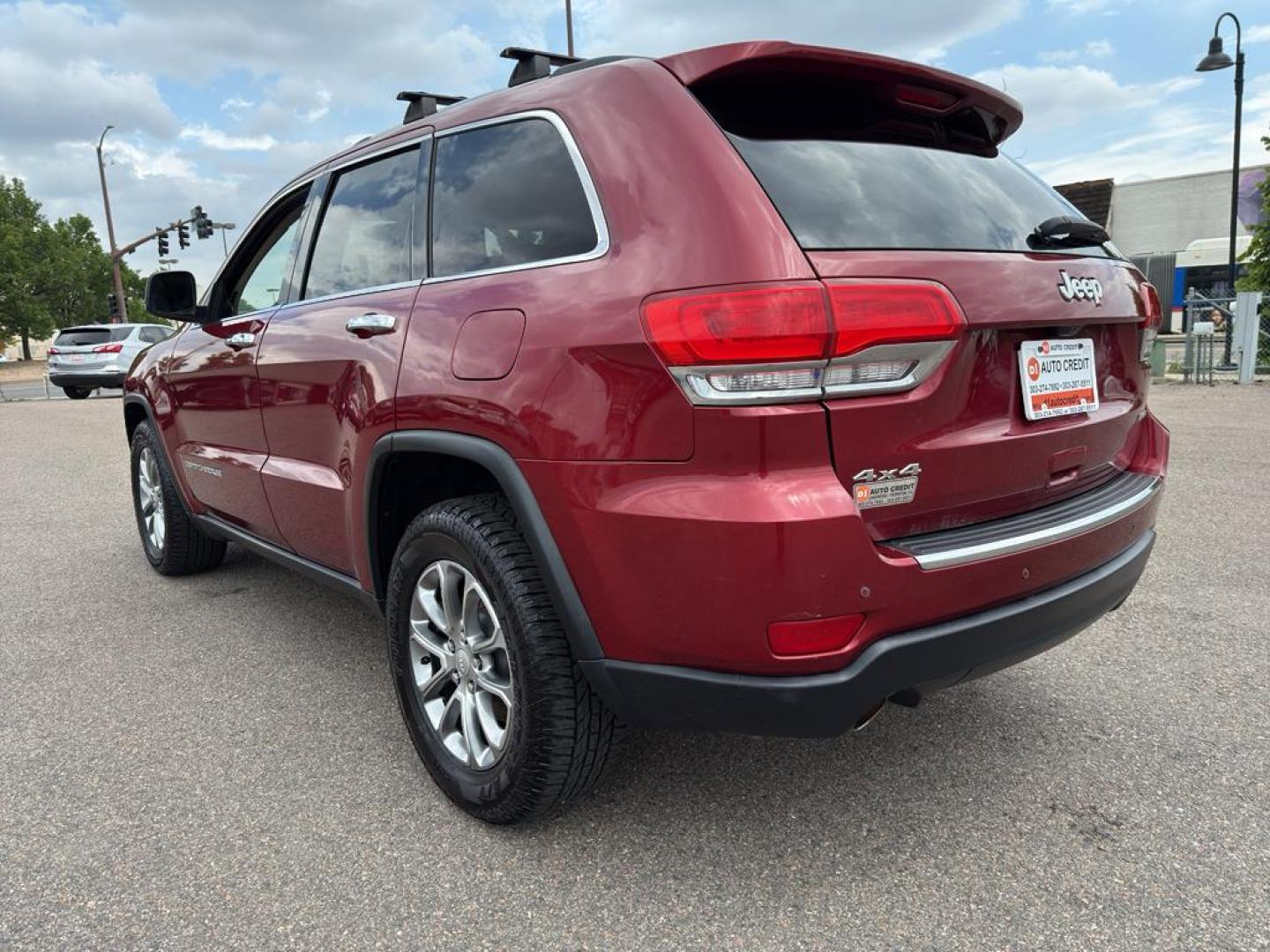 2014 RED Jeep Grand Cherokee Limited (1C4RJFBG0EC) with an V6, 3.6L engine, Automatic transmission, located at 10890 W. Colfax Ave., Lakewood, CO, 80215, (303) 274-7692, 39.739914, -105.120132 - Photo#6