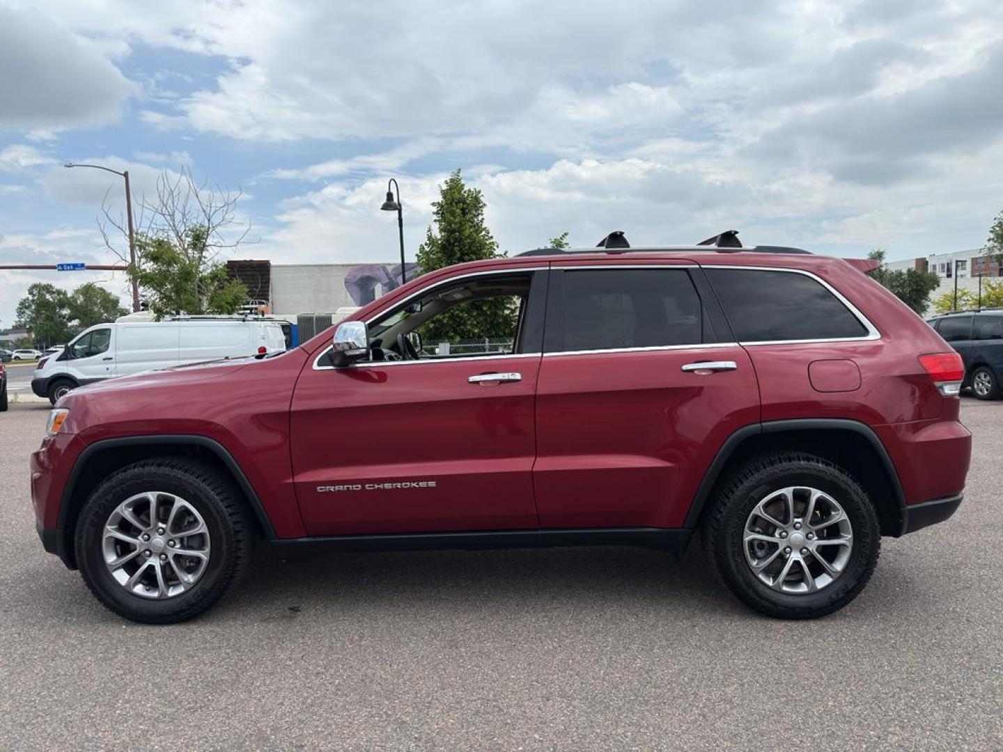 2014 RED Jeep Grand Cherokee Limited (1C4RJFBG0EC) with an V6, 3.6L engine, Automatic transmission, located at 10890 W. Colfax Ave., Lakewood, CO, 80215, (303) 274-7692, 39.739914, -105.120132 - Photo#7
