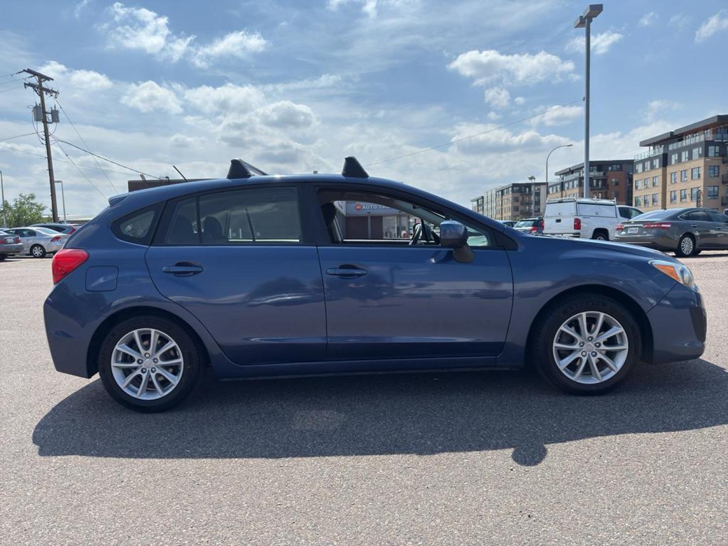 2013 BLUE Subaru Impreza Premium AWP (JF1GPAC66D2) with an 4 Cyl, 2.0L engine, Automatic transmission, located at 10890 W. Colfax Ave., Lakewood, CO, 80215, (303) 274-7692, 39.739914, -105.120132 - Photo#3