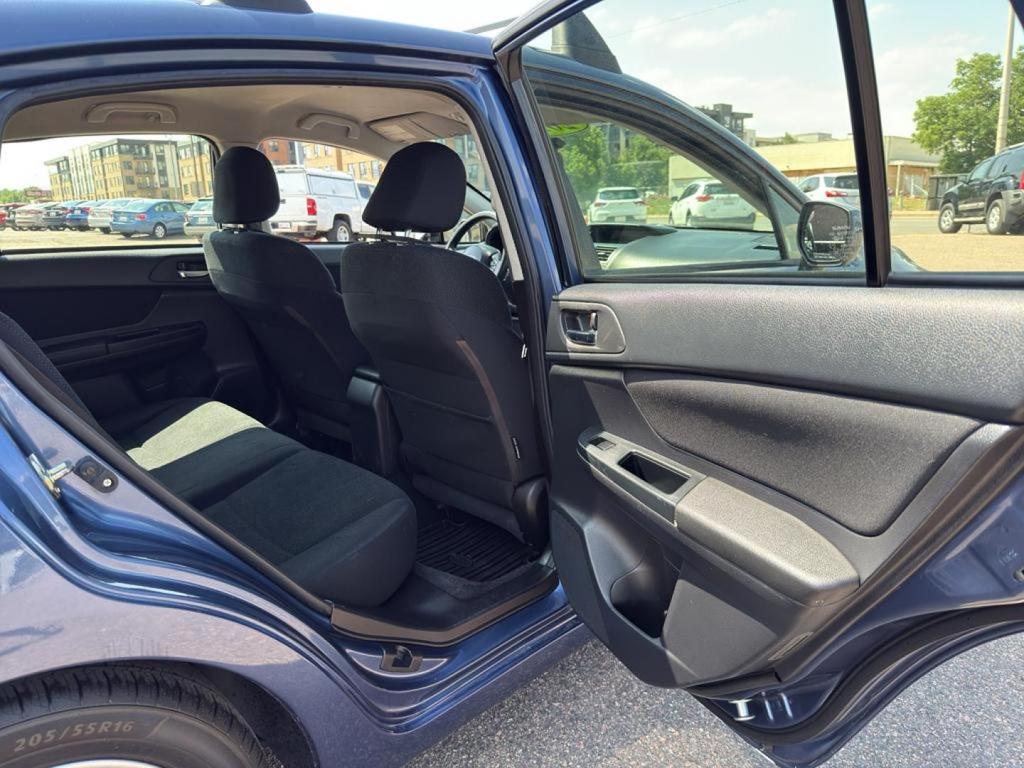 2013 BLUE Subaru Impreza Premium AWP (JF1GPAC66D2) with an 4 Cyl, 2.0L engine, Automatic transmission, located at 10890 W. Colfax Ave., Lakewood, CO, 80215, (303) 274-7692, 39.739914, -105.120132 - Photo#10