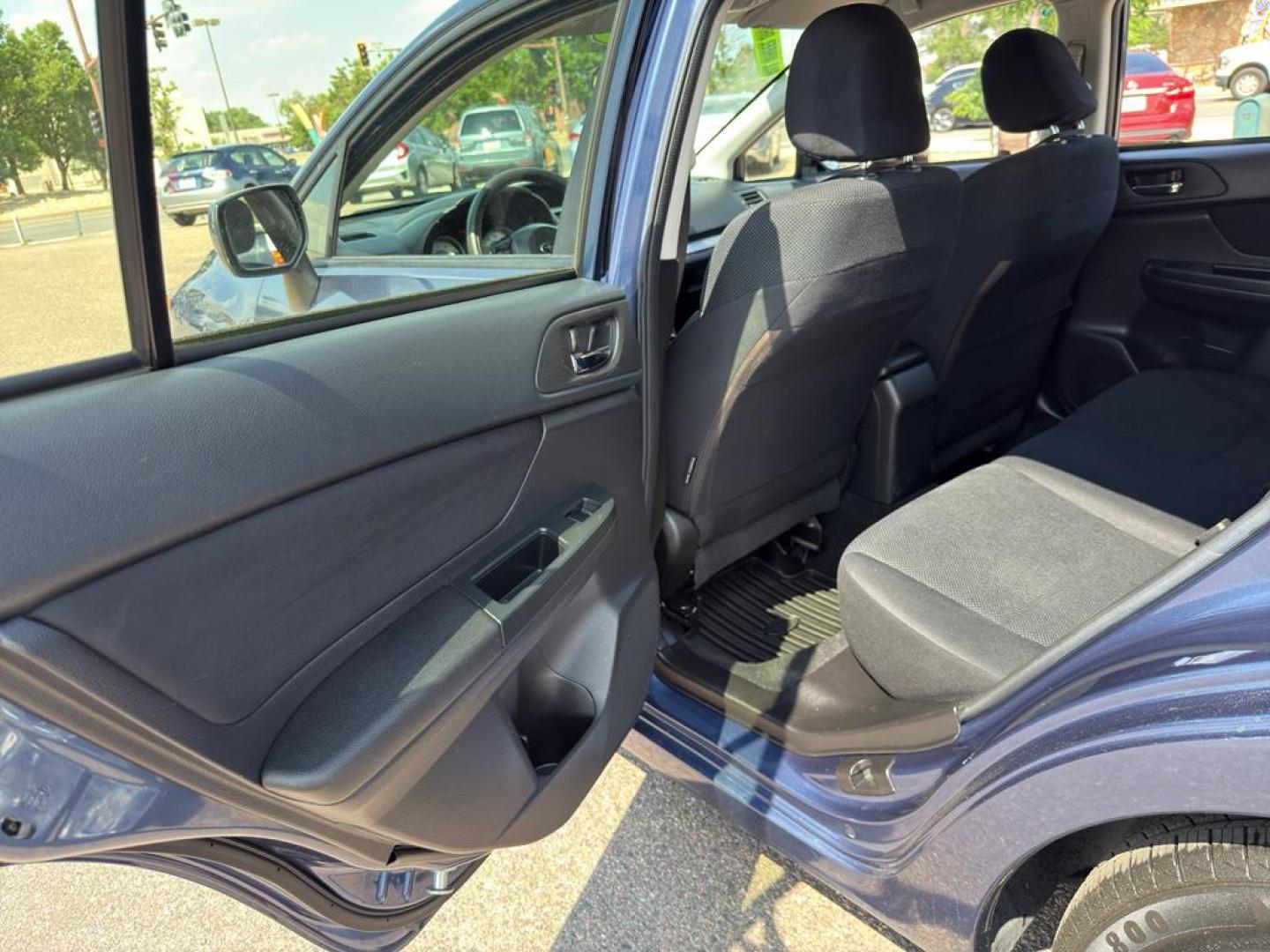 2013 BLUE Subaru Impreza Premium AWP (JF1GPAC66D2) with an 4 Cyl, 2.0L engine, Automatic transmission, located at 10890 W. Colfax Ave., Lakewood, CO, 80215, (303) 274-7692, 39.739914, -105.120132 - Photo#13