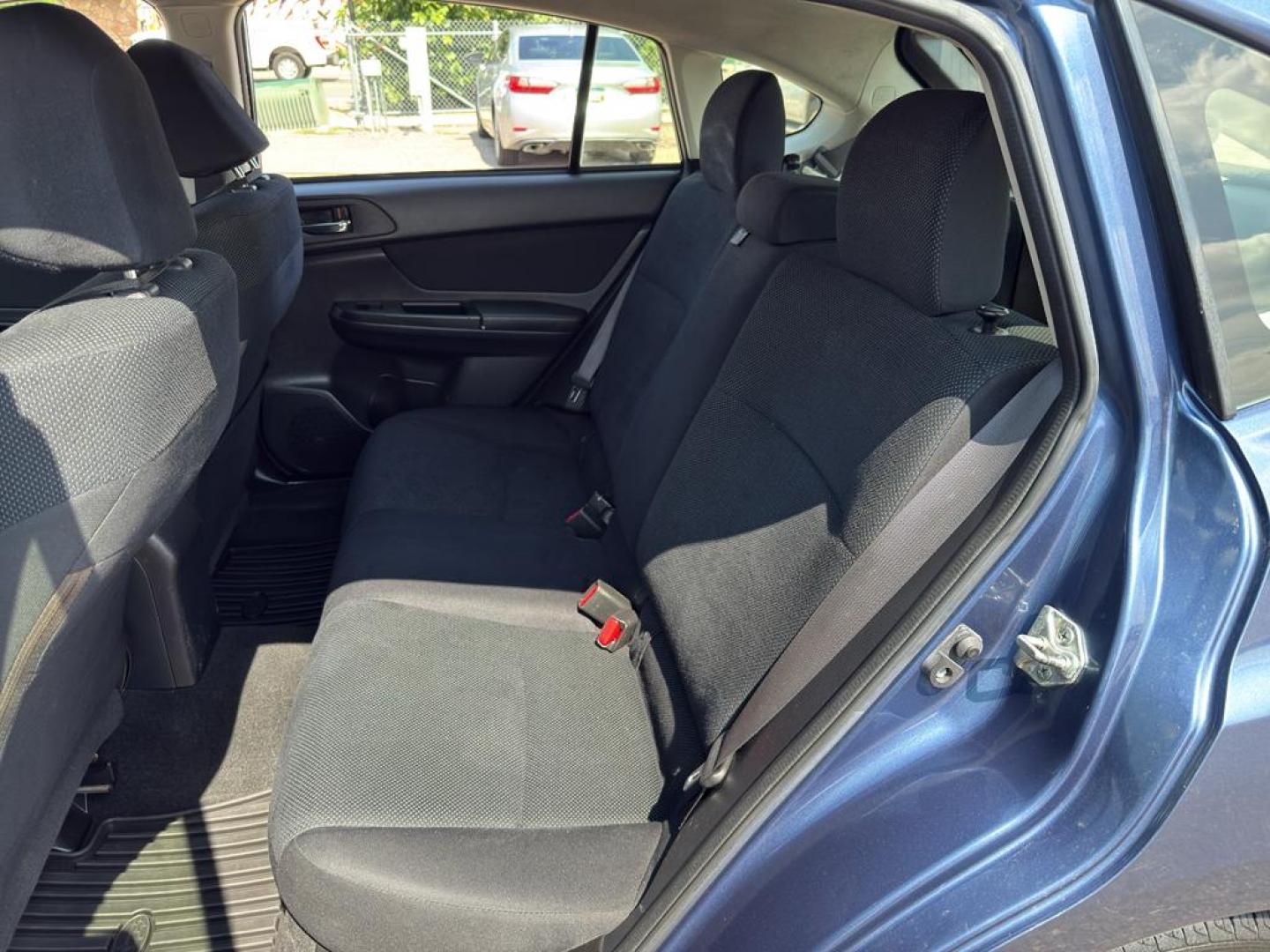 2013 BLUE Subaru Impreza Premium AWP (JF1GPAC66D2) with an 4 Cyl, 2.0L engine, Automatic transmission, located at 10890 W. Colfax Ave., Lakewood, CO, 80215, (303) 274-7692, 39.739914, -105.120132 - Photo#14
