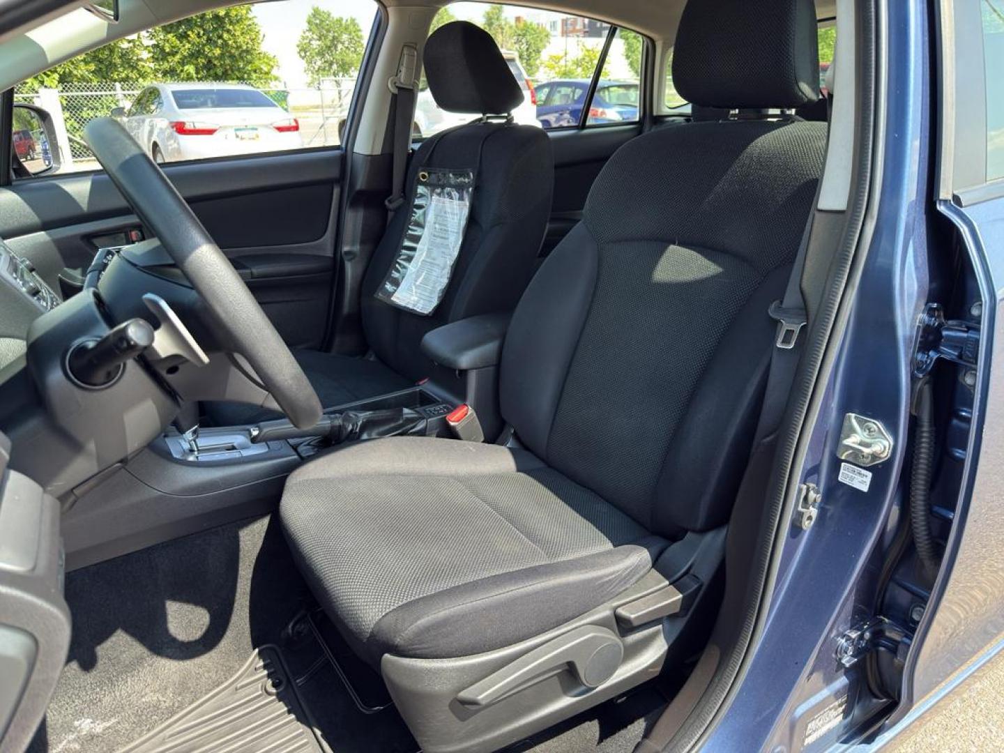 2013 BLUE Subaru Impreza Premium AWP (JF1GPAC66D2) with an 4 Cyl, 2.0L engine, Automatic transmission, located at 10890 W. Colfax Ave., Lakewood, CO, 80215, (303) 274-7692, 39.739914, -105.120132 - Photo#16